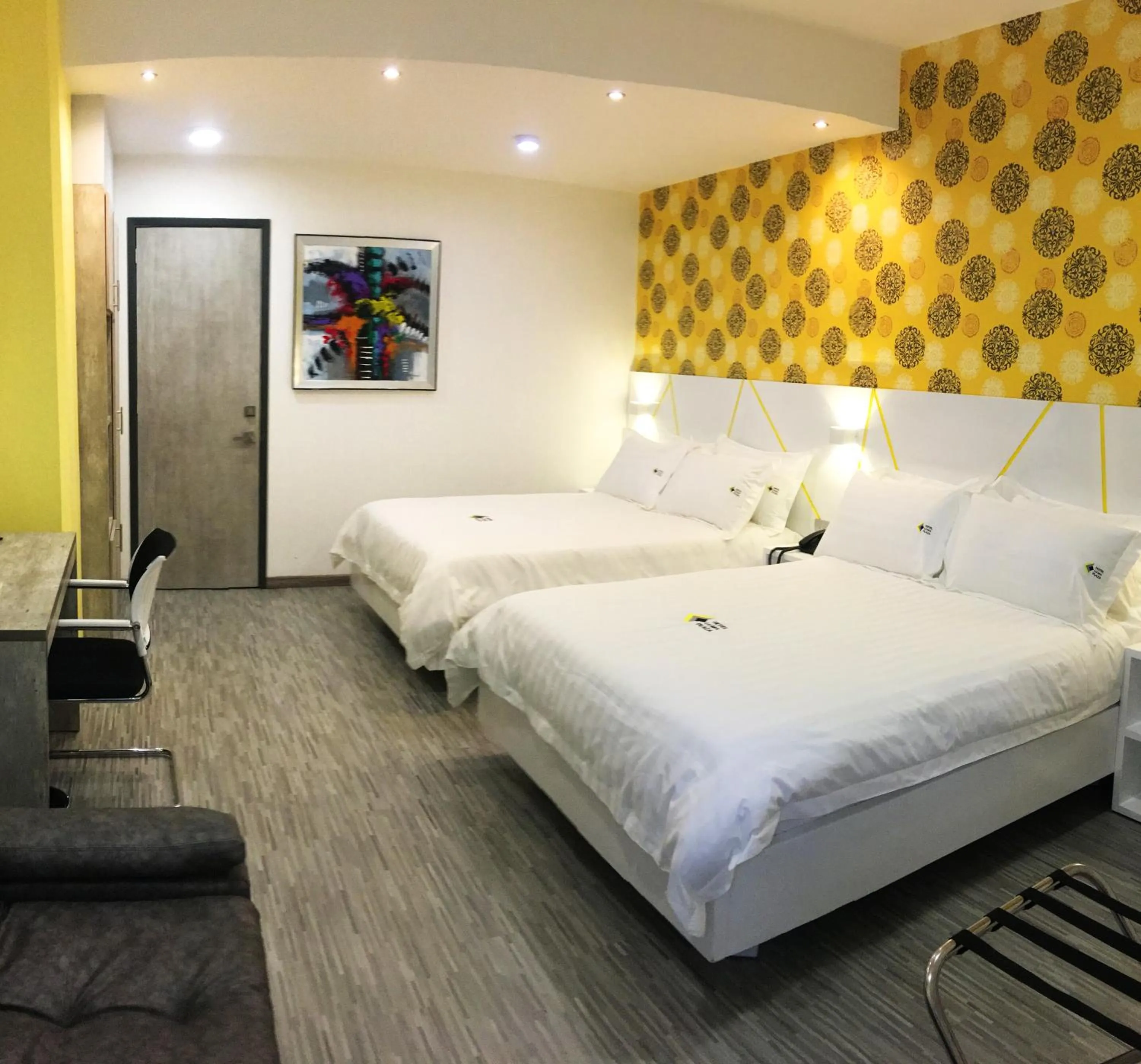 Bed in Luma Plaza Hotel