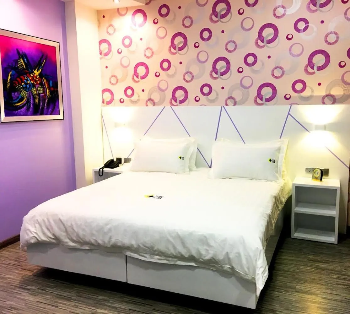 Bed in Luma Plaza Hotel