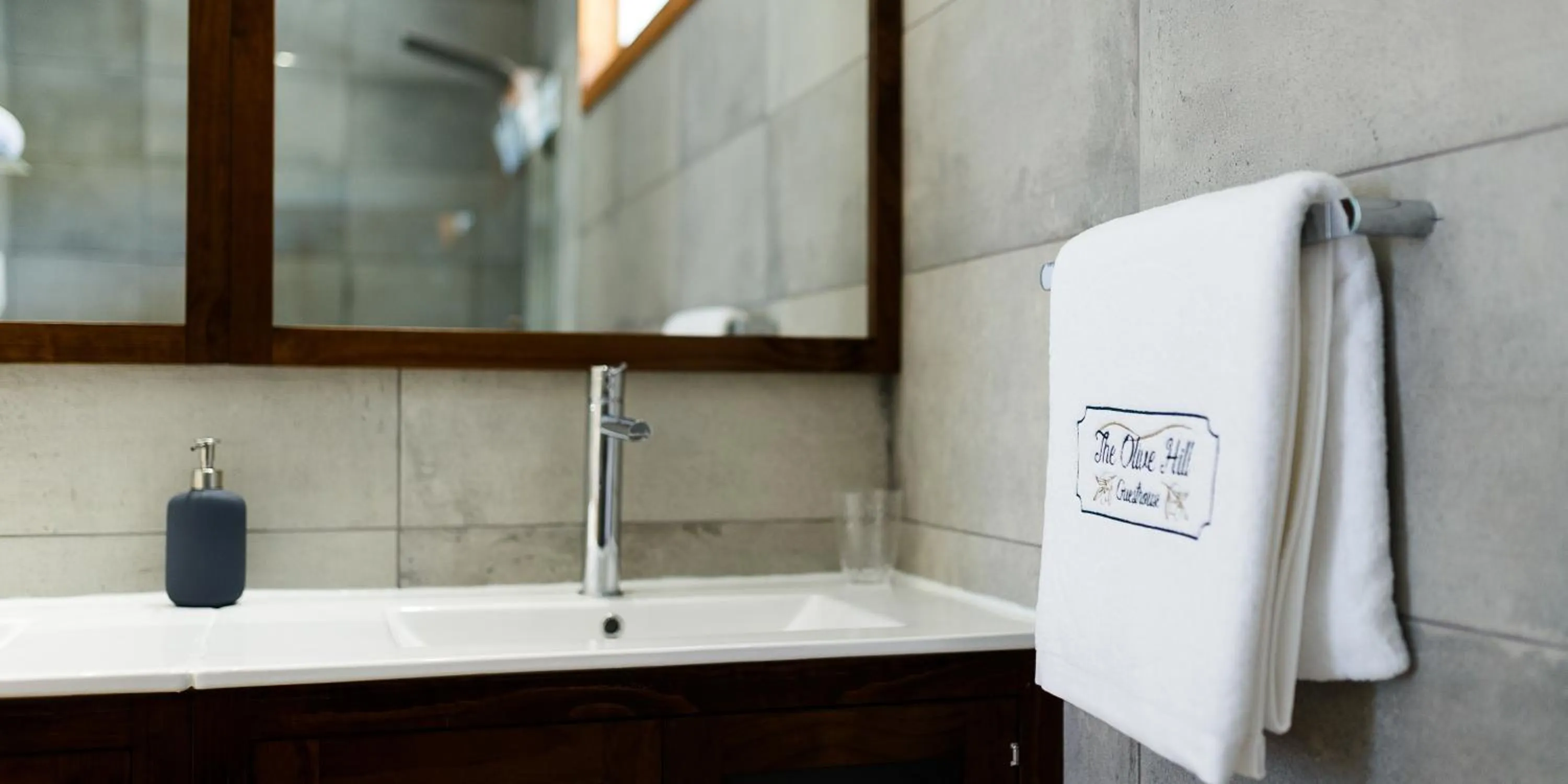 Property logo or sign in The Olive Hill Guesthouse