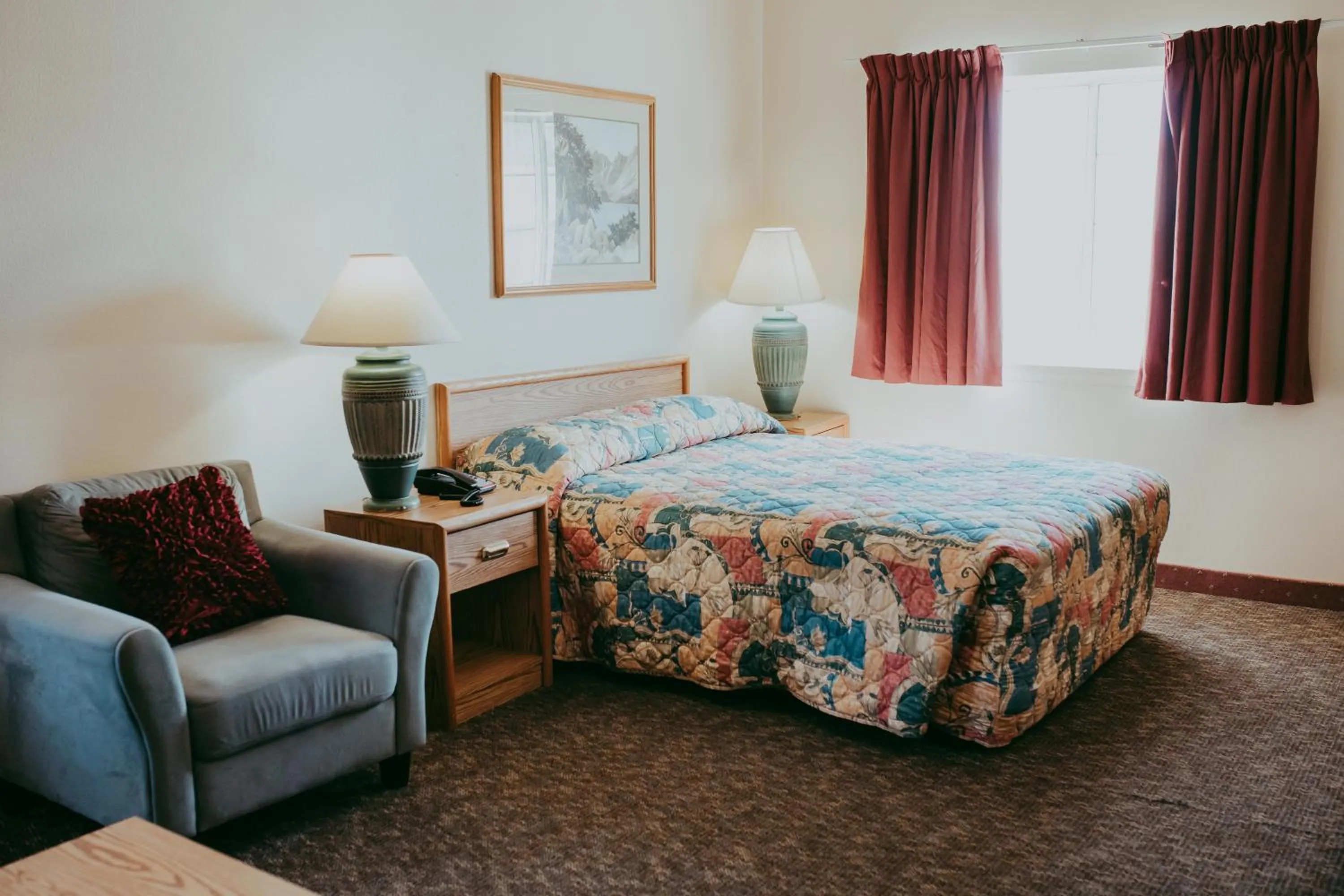 Bed in Carson City Plaza Hotel