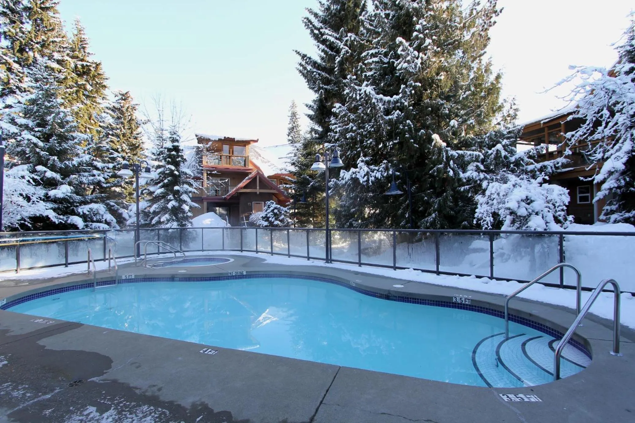 Swimming pool in Glacier's Reach by Whistler Retreats
