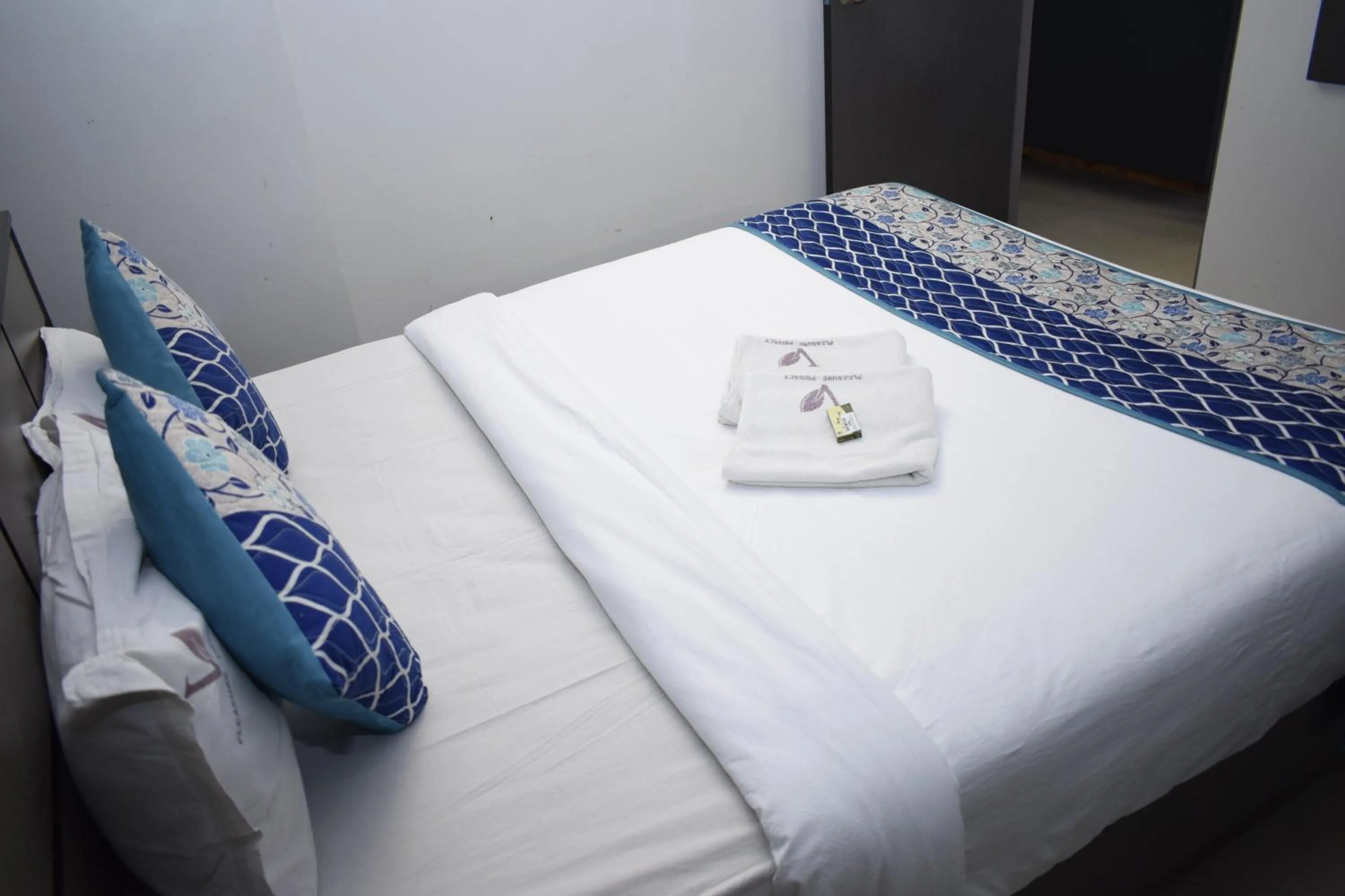 Photo of the whole room, Bed in Viswa Residency by Azalea