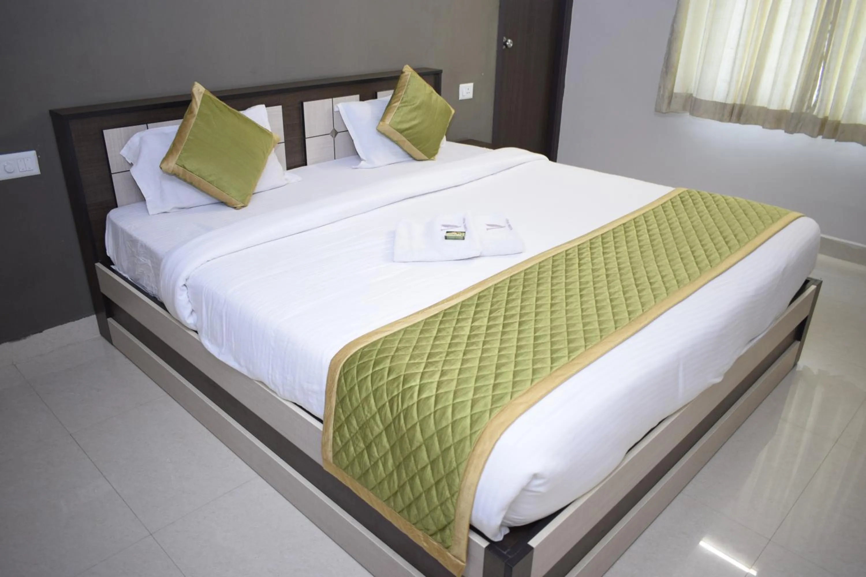 Bed in Viswa Residency by Azalea