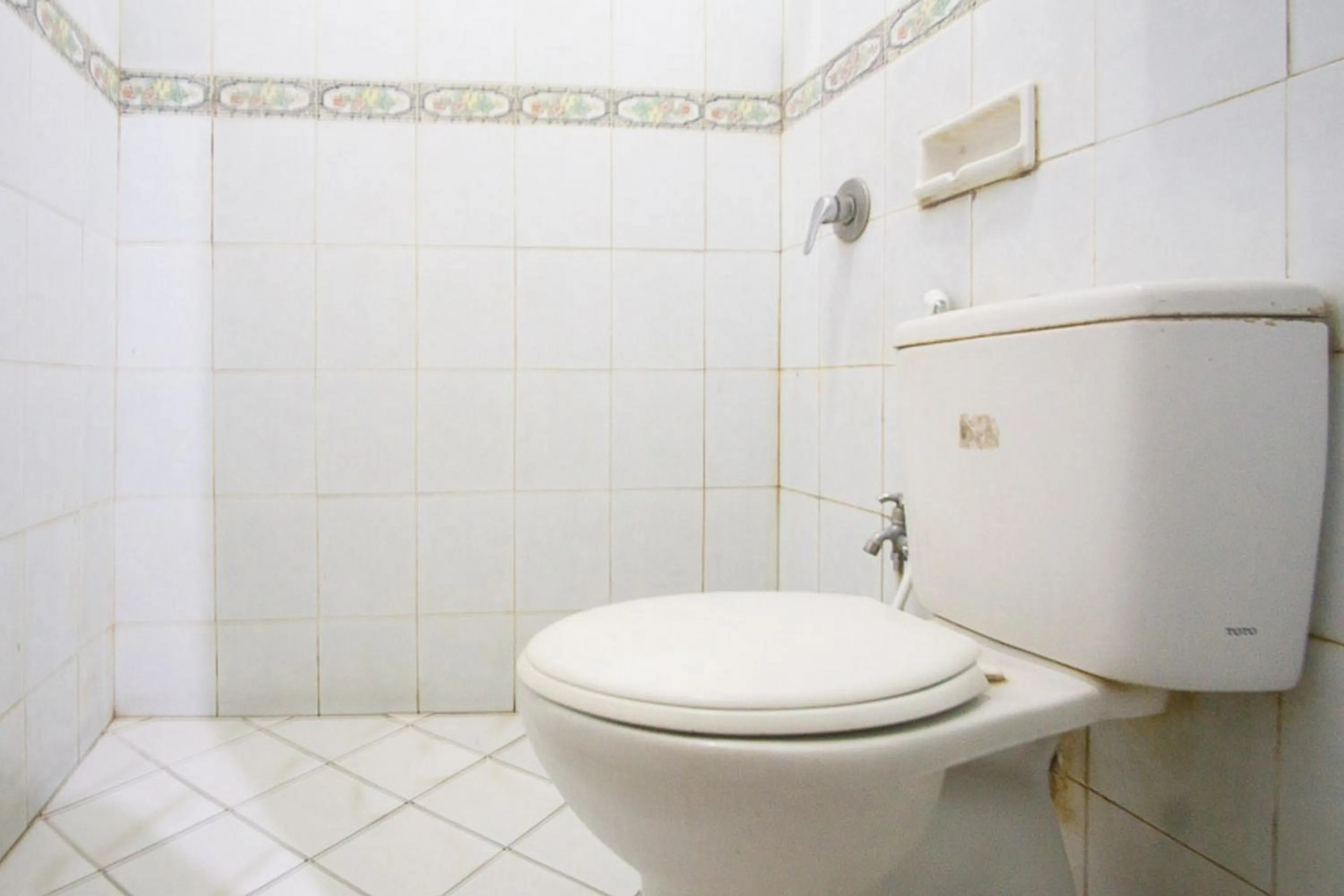 Bathroom in RedDoorz near Pantai Falajawa Kota Ternate