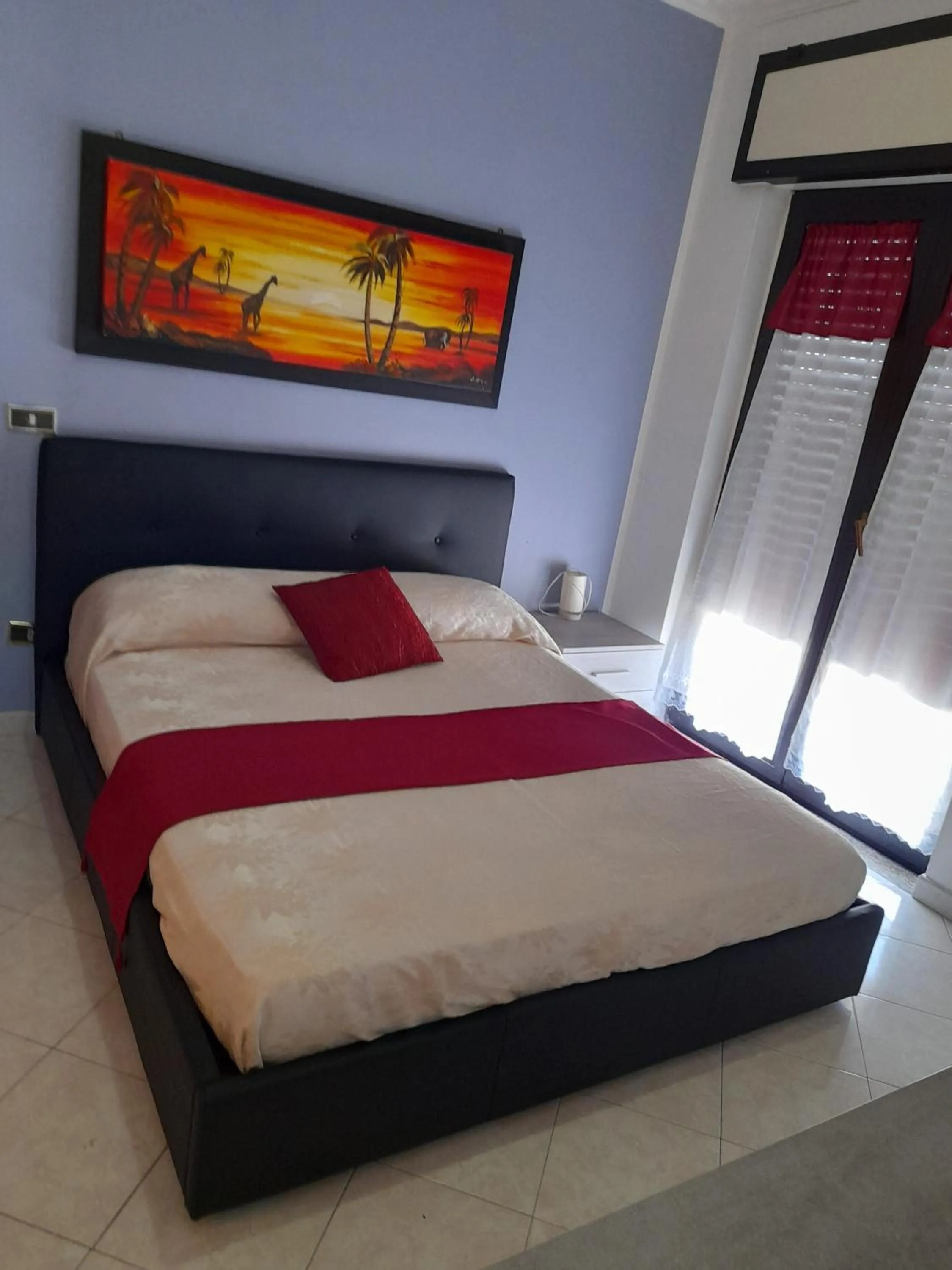 Bed in Hotel De Rosa