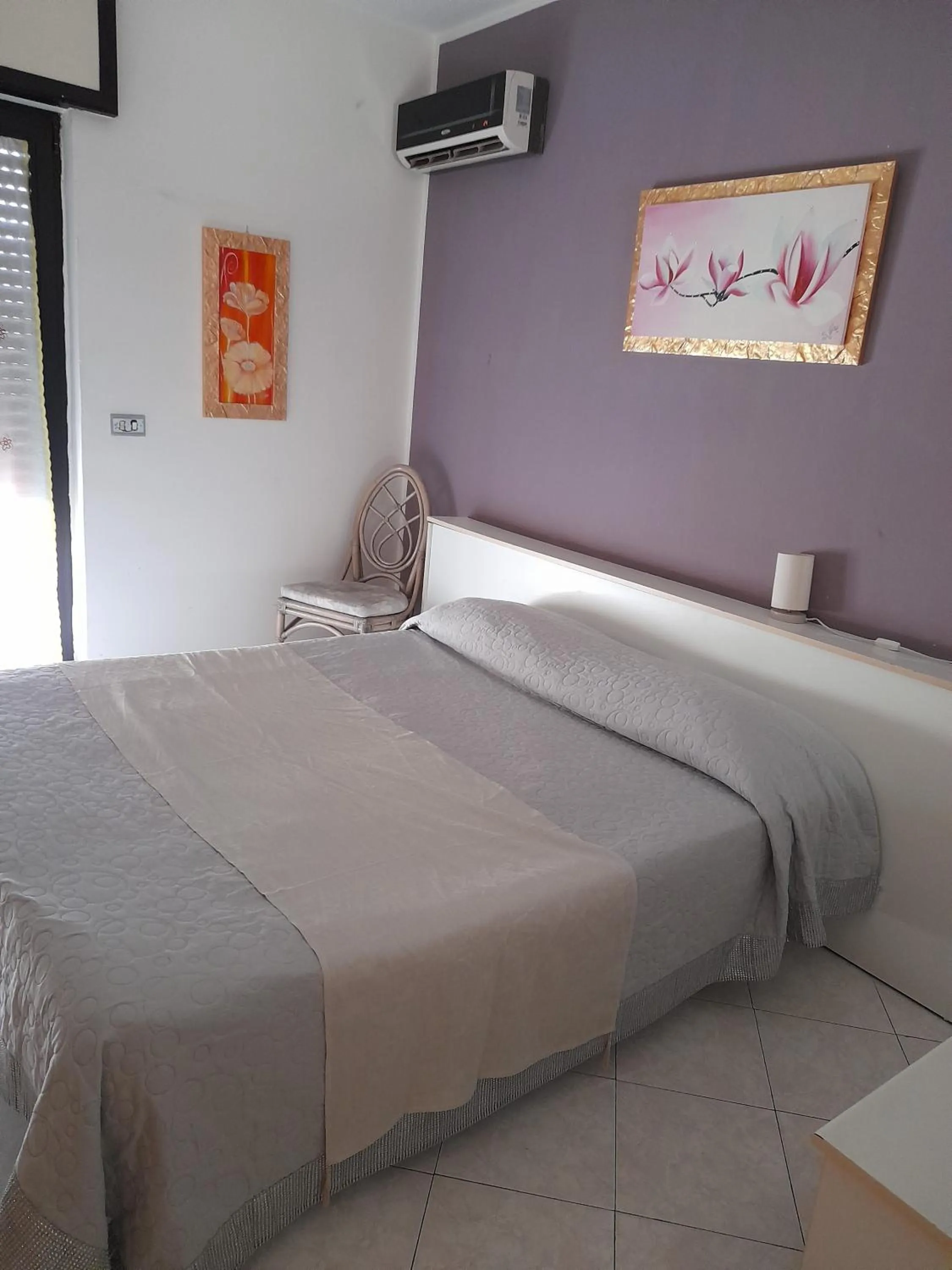 Bed in Hotel De Rosa