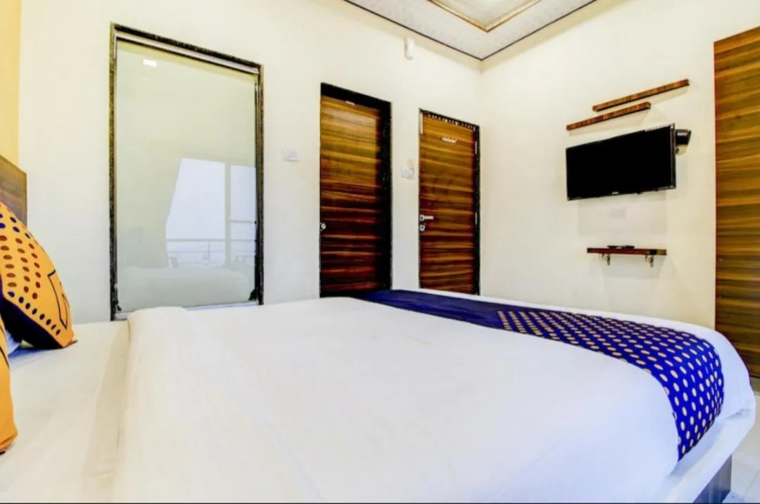 Bed in Evergreen Holidays Mahabaleshwar