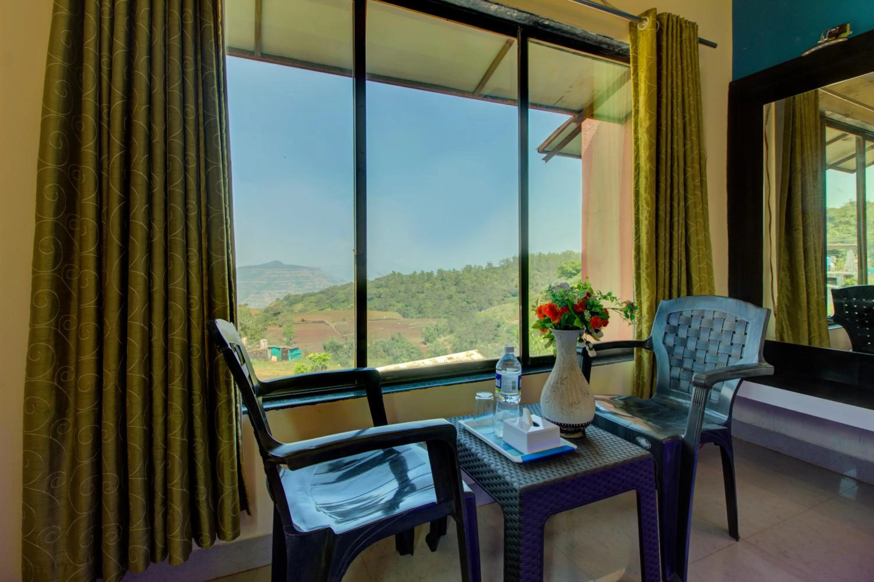 Seating area in Evergreen Holidays Mahabaleshwar