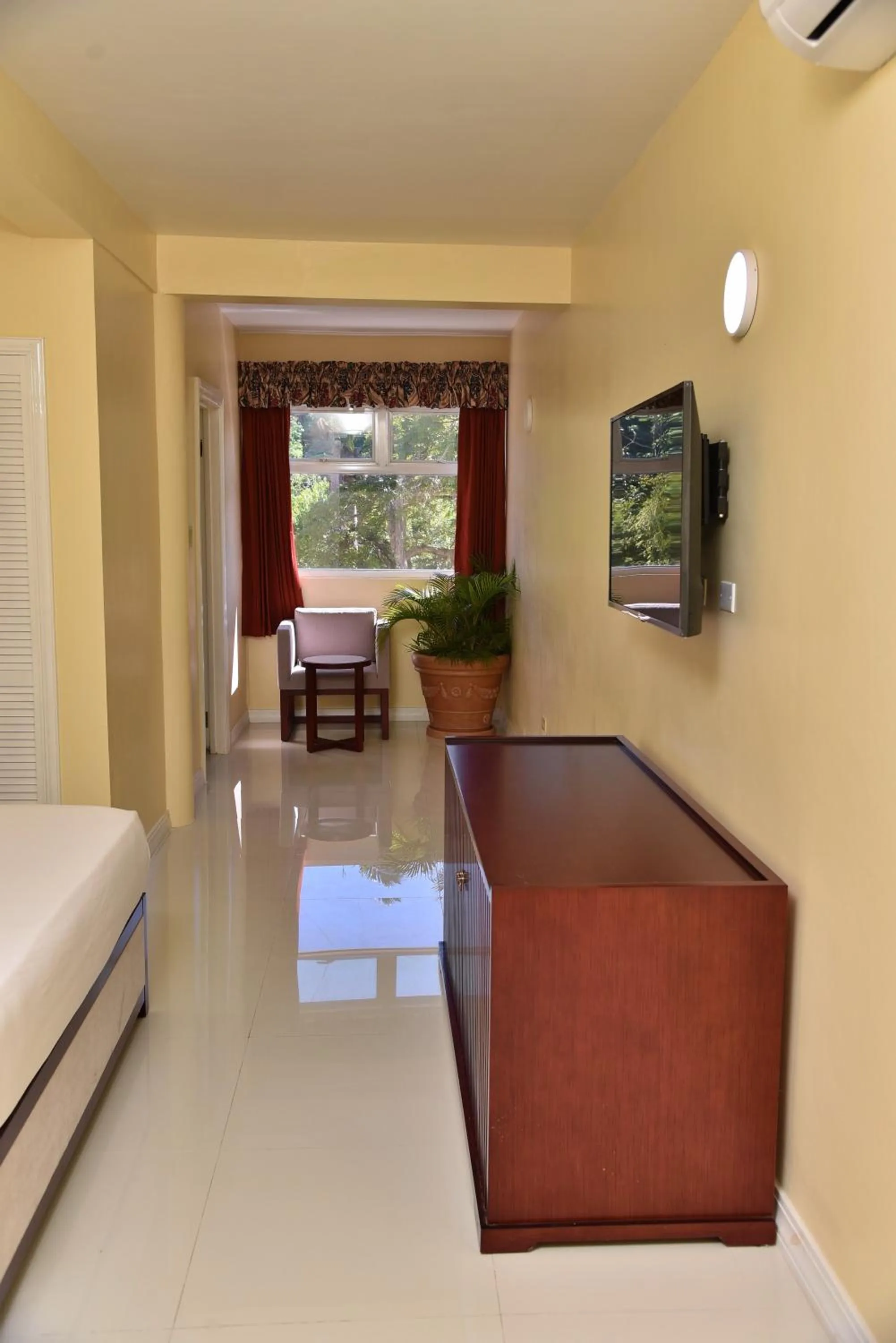 Seating area, Bed in Hotel Grand A View