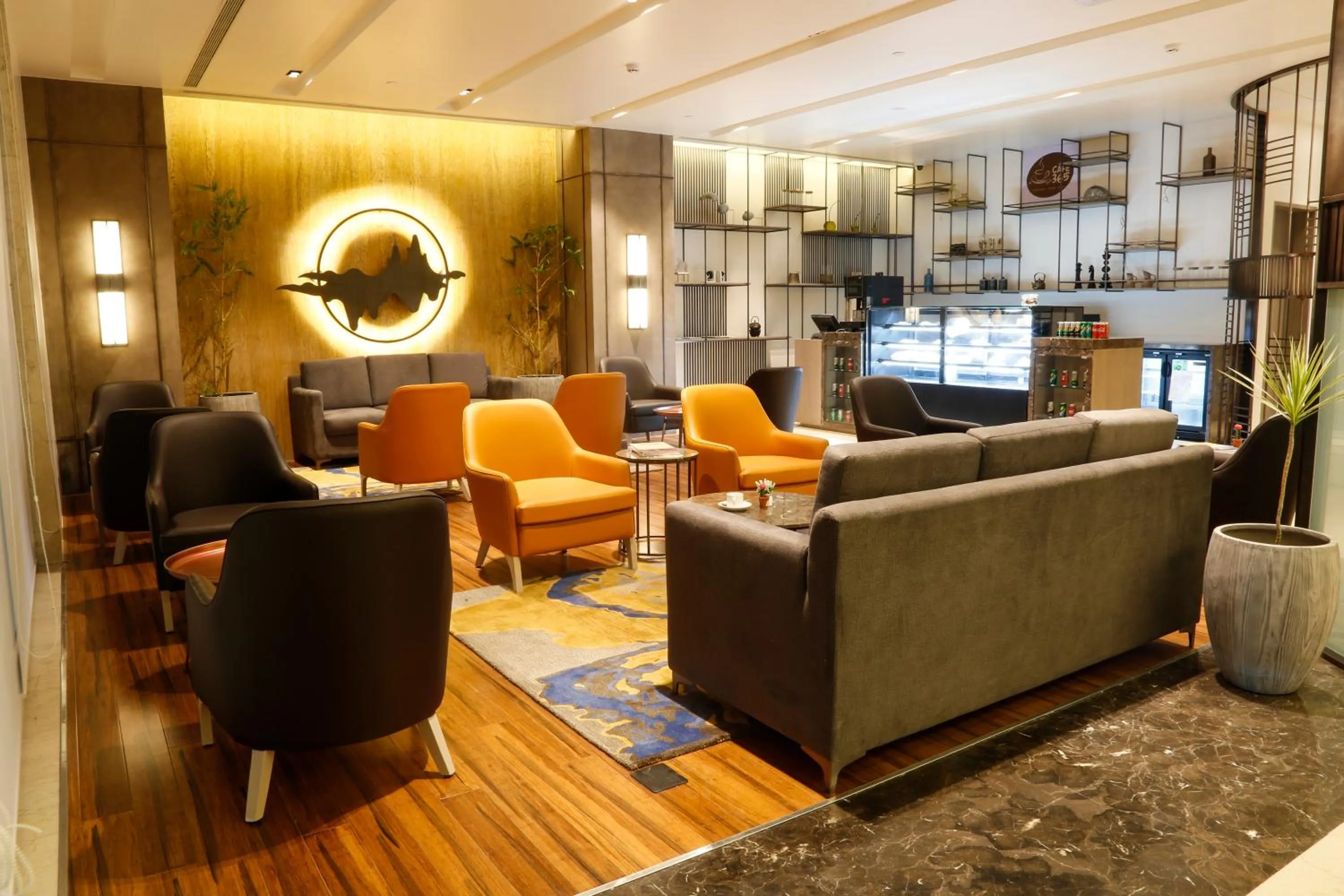 Seating area in Royal Hometel Suites