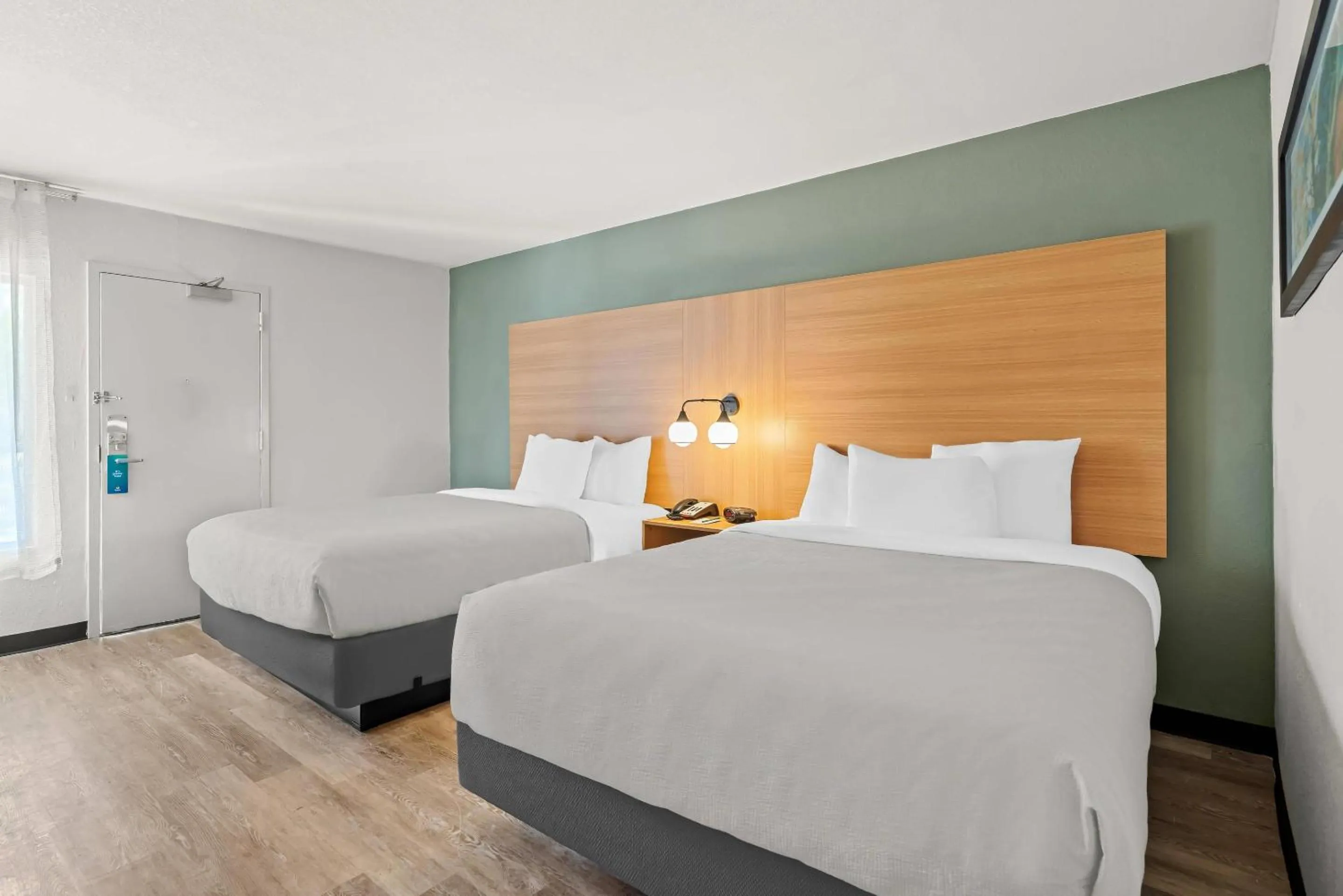 Bedroom, Bed in Quality Inn Orlando Near International Drive