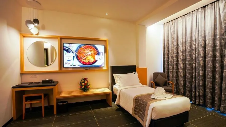 Photo of the whole room, Bed in TSR Seafront Hotel