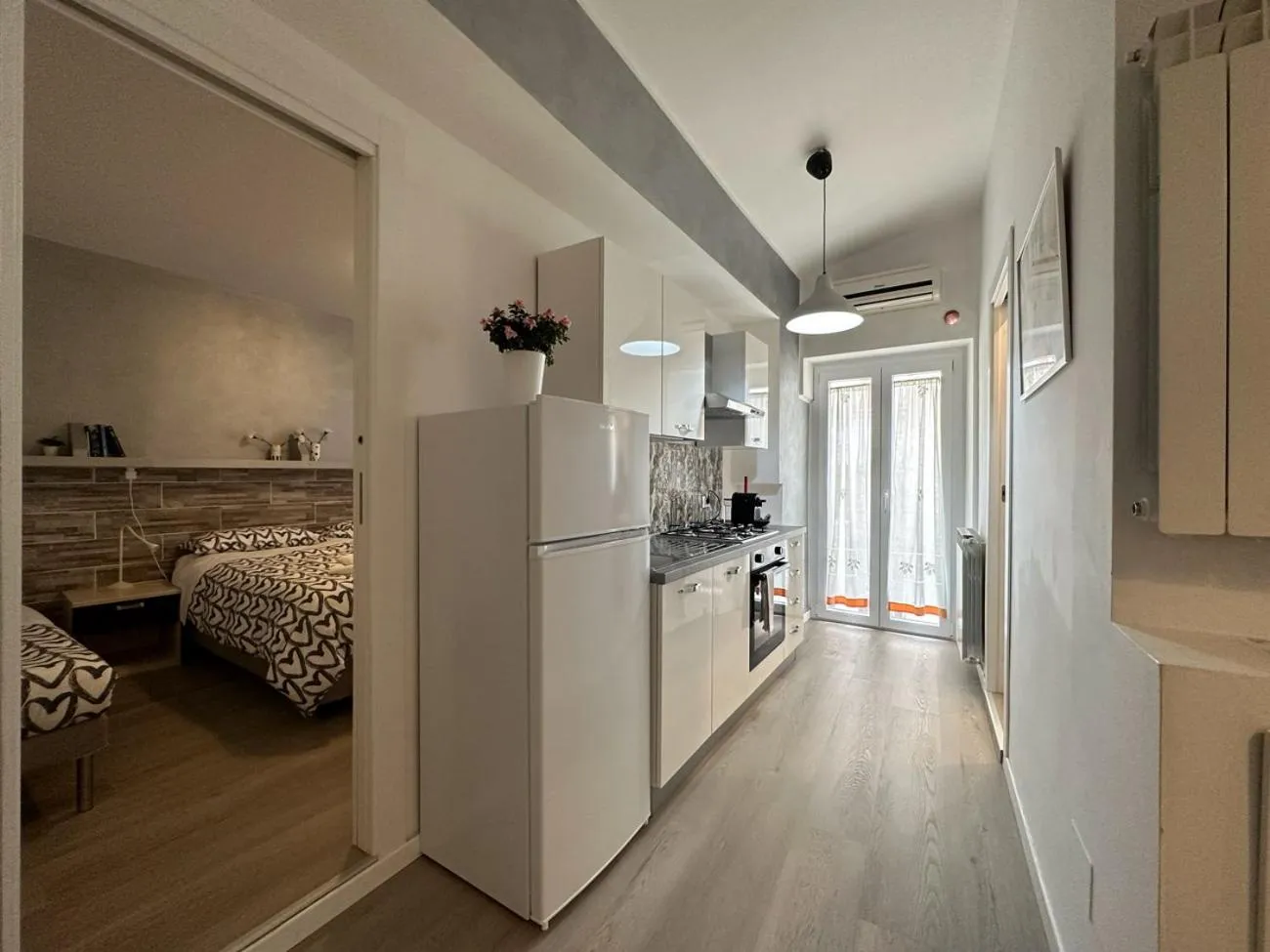 Kitchen or kitchenette, Bed in Santa Lucia