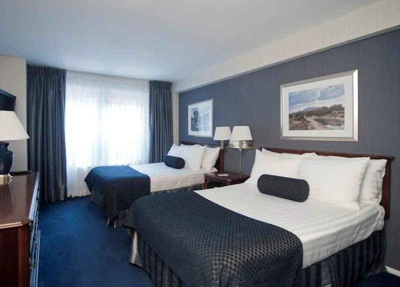 Bedroom, Bed in Murray Hill East Suites - Extended Stay