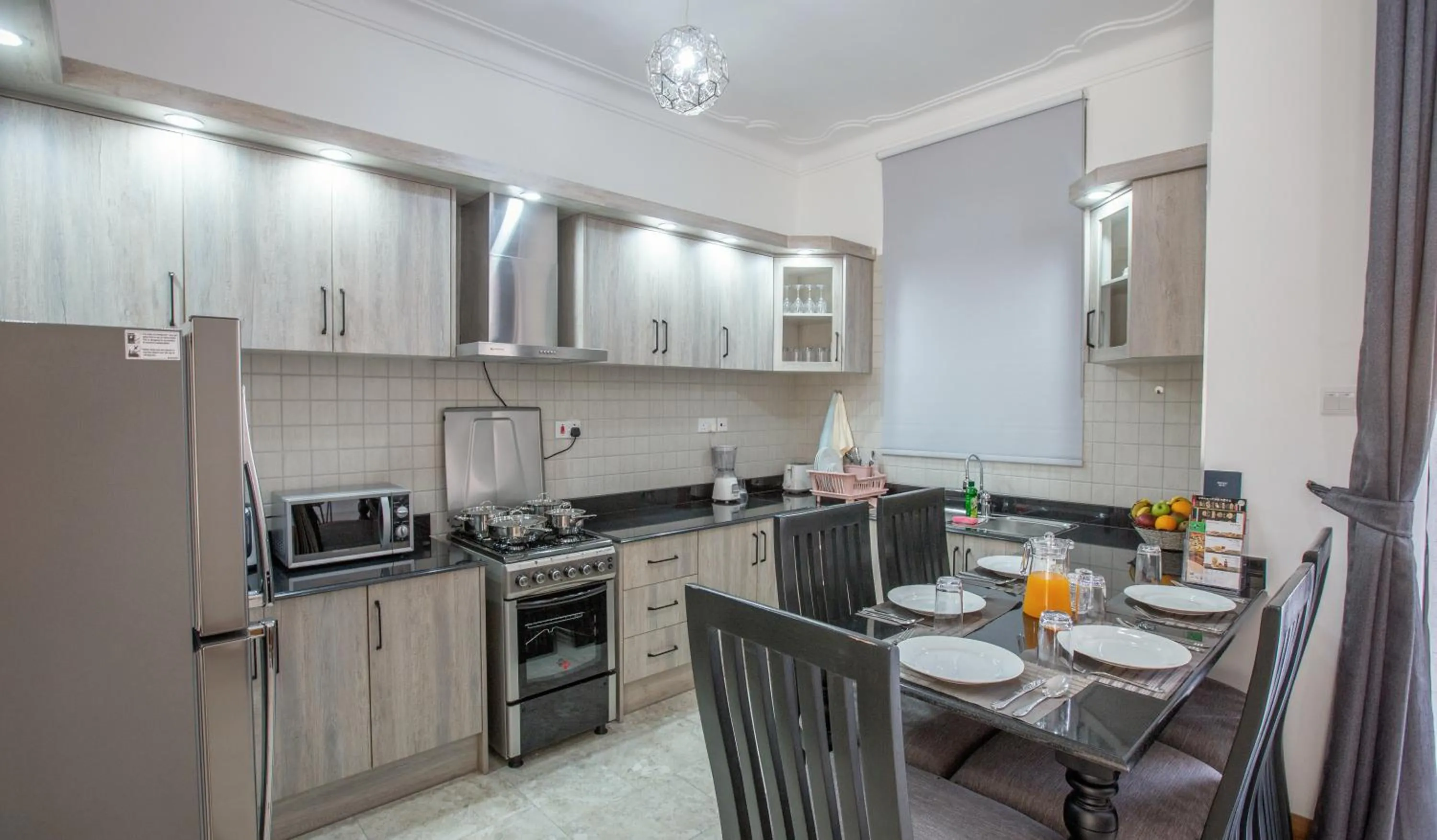 Kitchen or kitchenette in Caran Apartments
