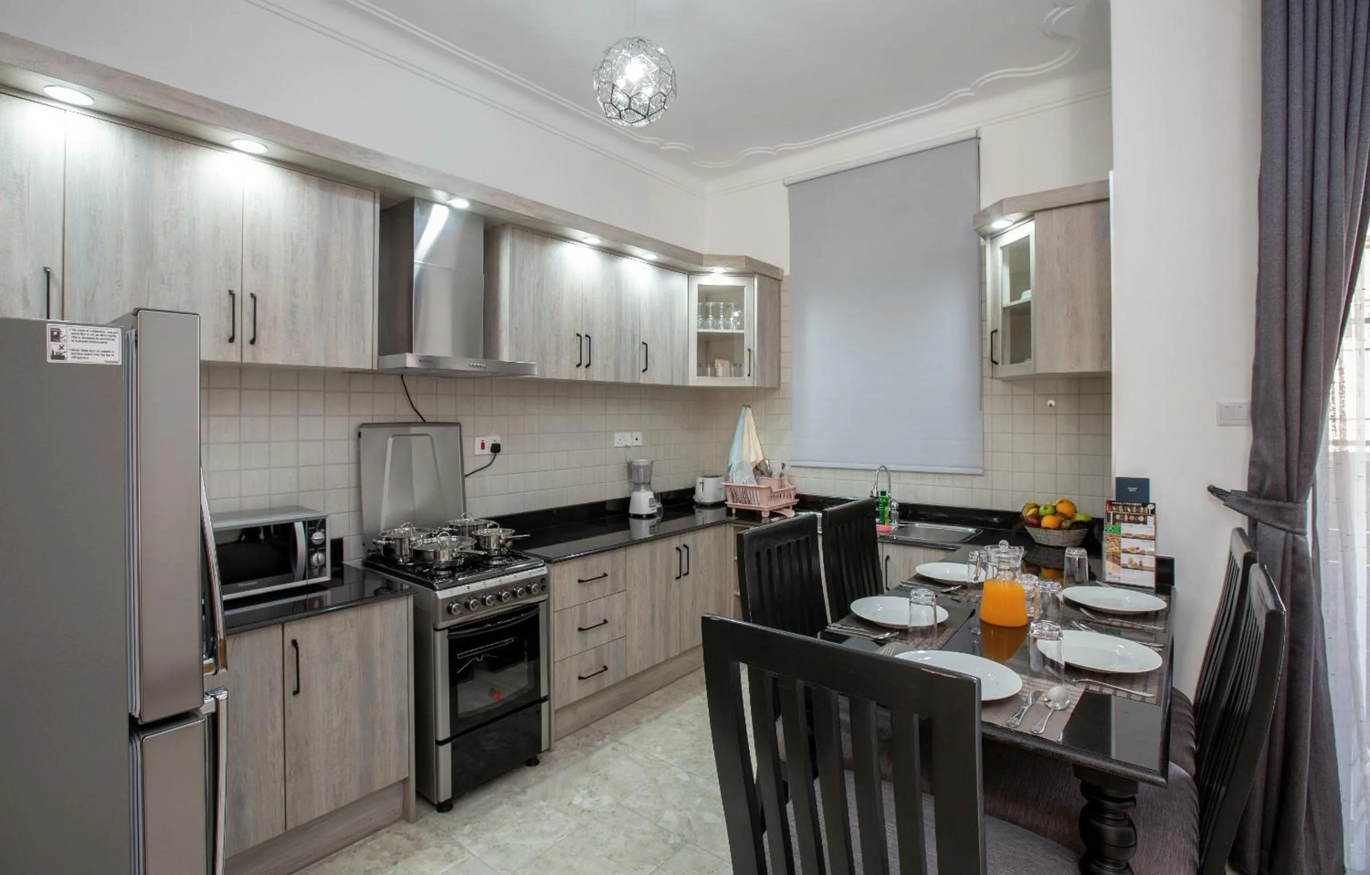 Kitchen or kitchenette in Caran Apartments