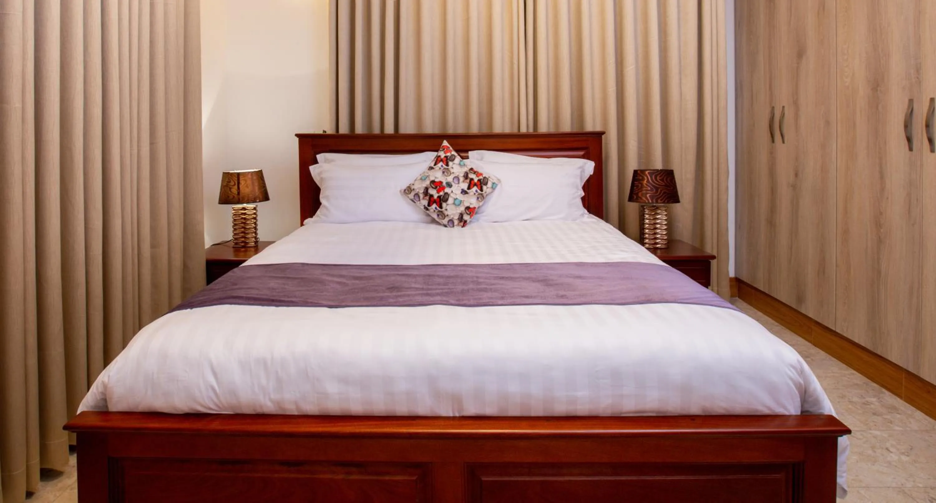 Bed in Caran Apartments
