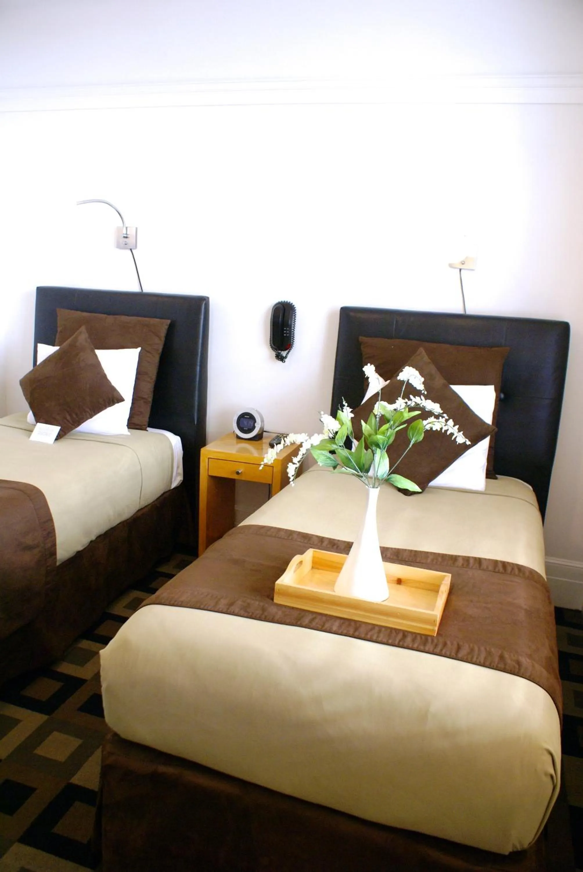 Toilet, Bed in The Mosser Hotel