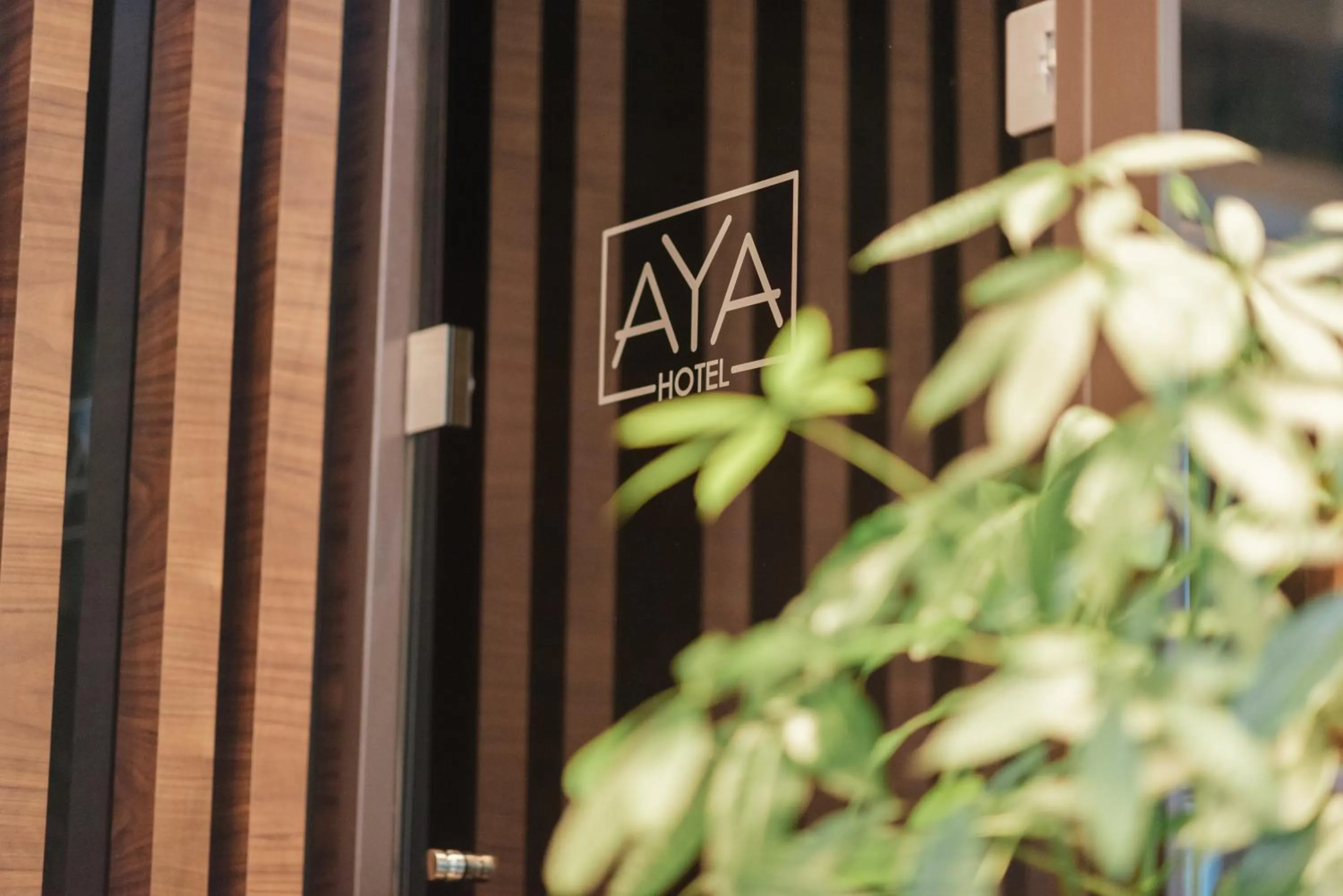 Property logo or sign in Aya Hotel