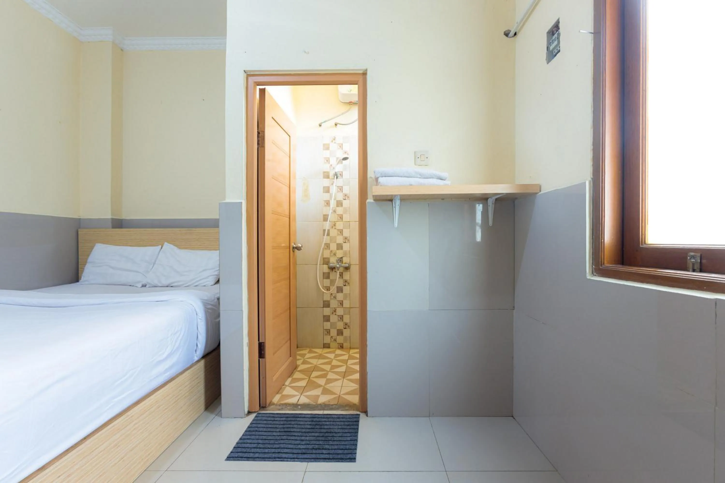 Bed in Super OYO 1524 D' Paseban