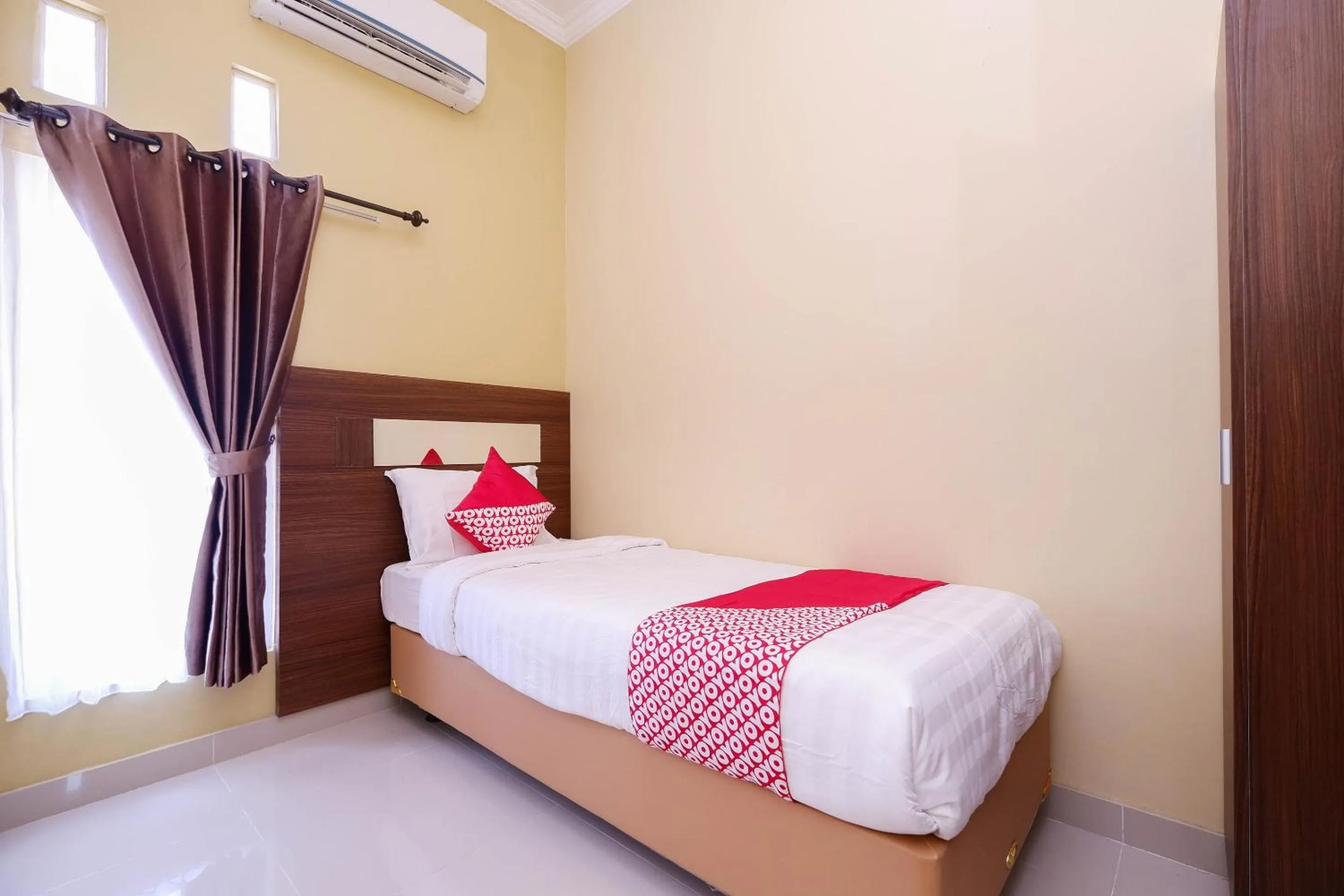 Bedroom in Super OYO 1506 Shabrina 2 Syariah