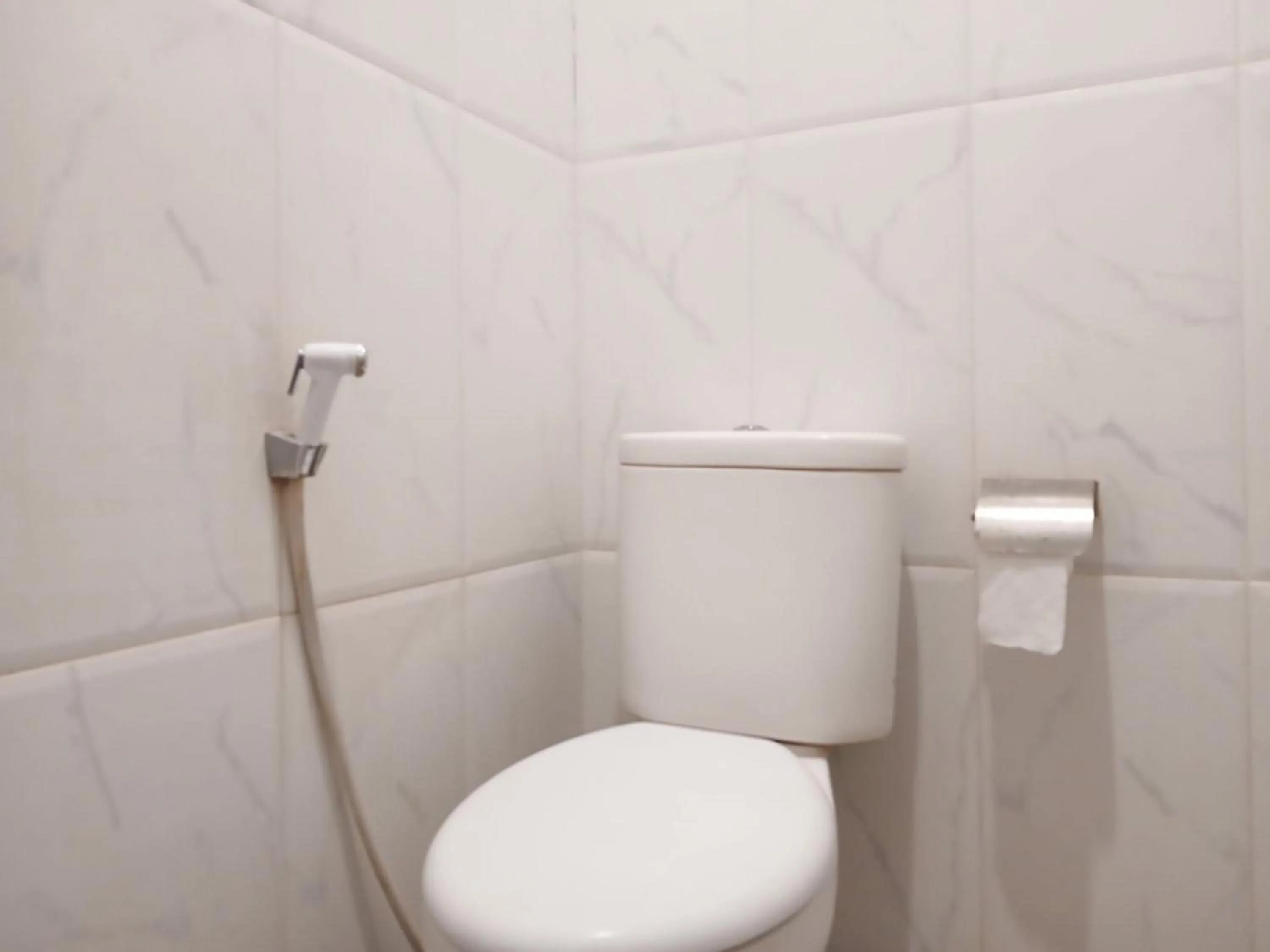 Bathroom in Shabrina Homestay Syariah Terminal Tirtonadi Solo RedPartner