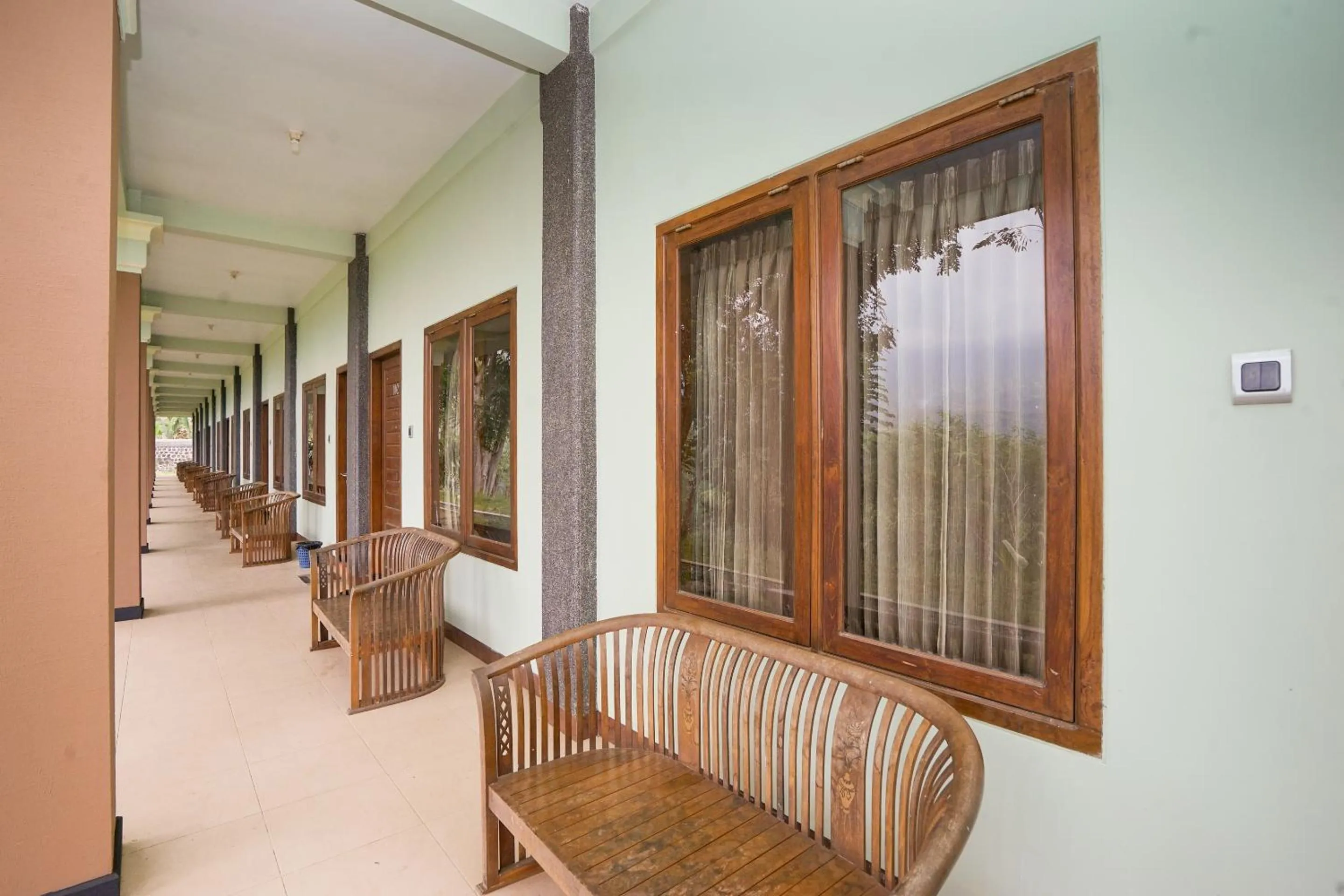 Seating area in Hotel Bumi Bermi Permai near Bermi Eco Park Mitra RedDoorz