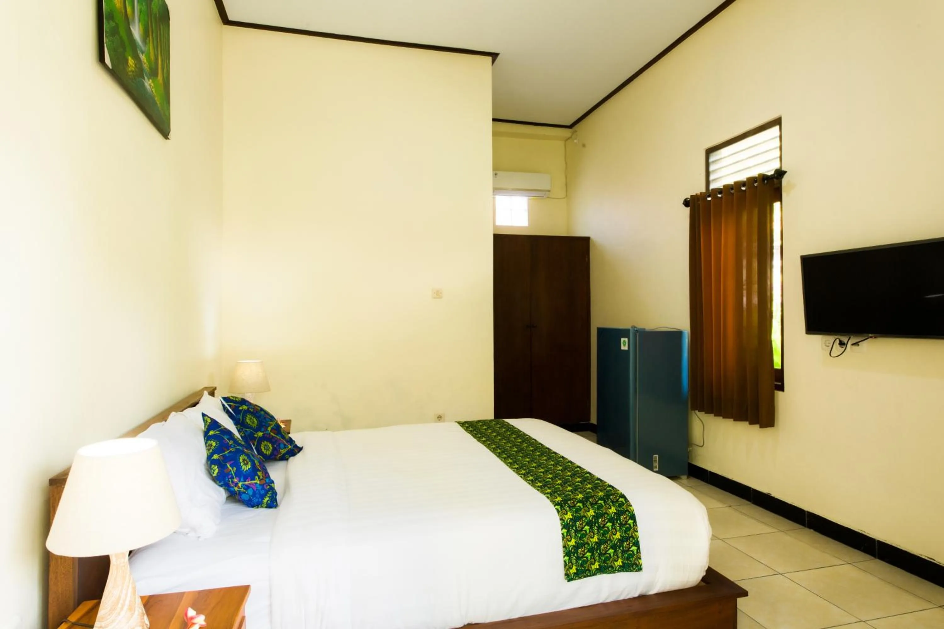 TV and multimedia, Bed in Manda Homestay