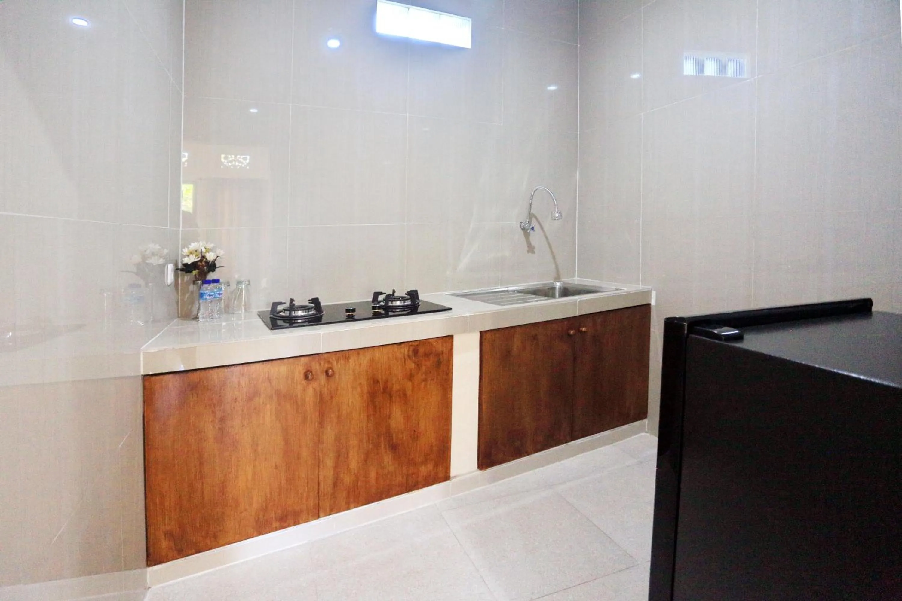 Kitchen or kitchenette in Manda Homestay