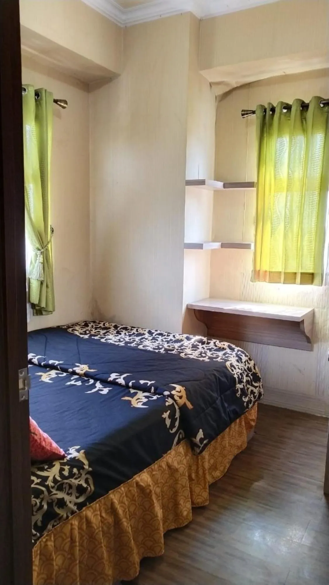 Bedroom, Bed in The Suites Metro by Faris Property