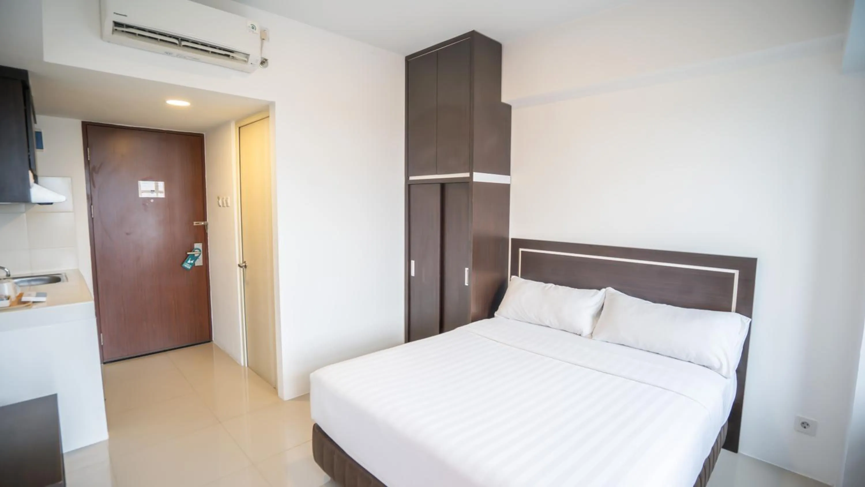 Bed in Bigland Bogor Hotel Powered by Archipelago