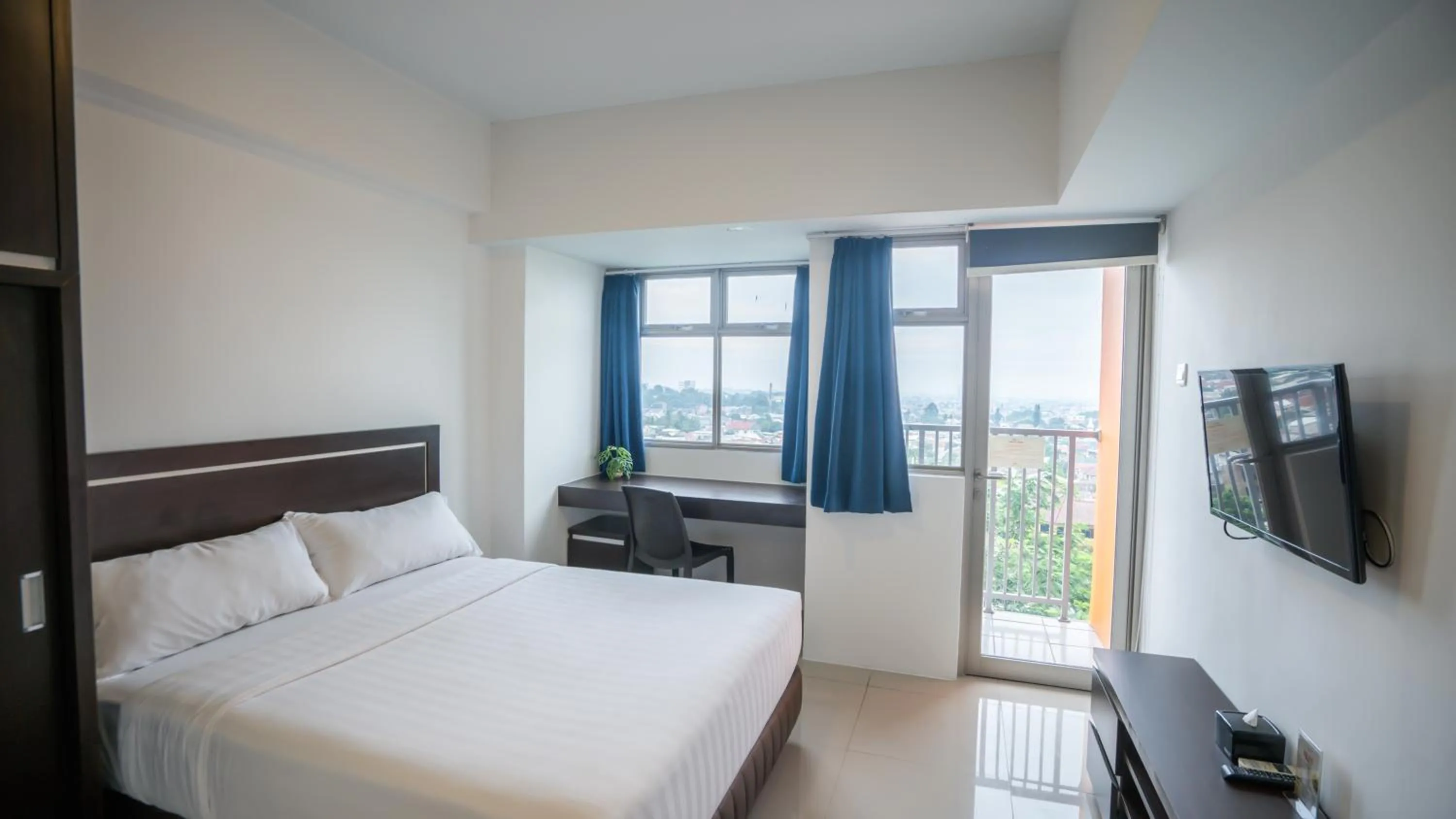 Bed in Bigland Bogor Hotel Powered by Archipelago