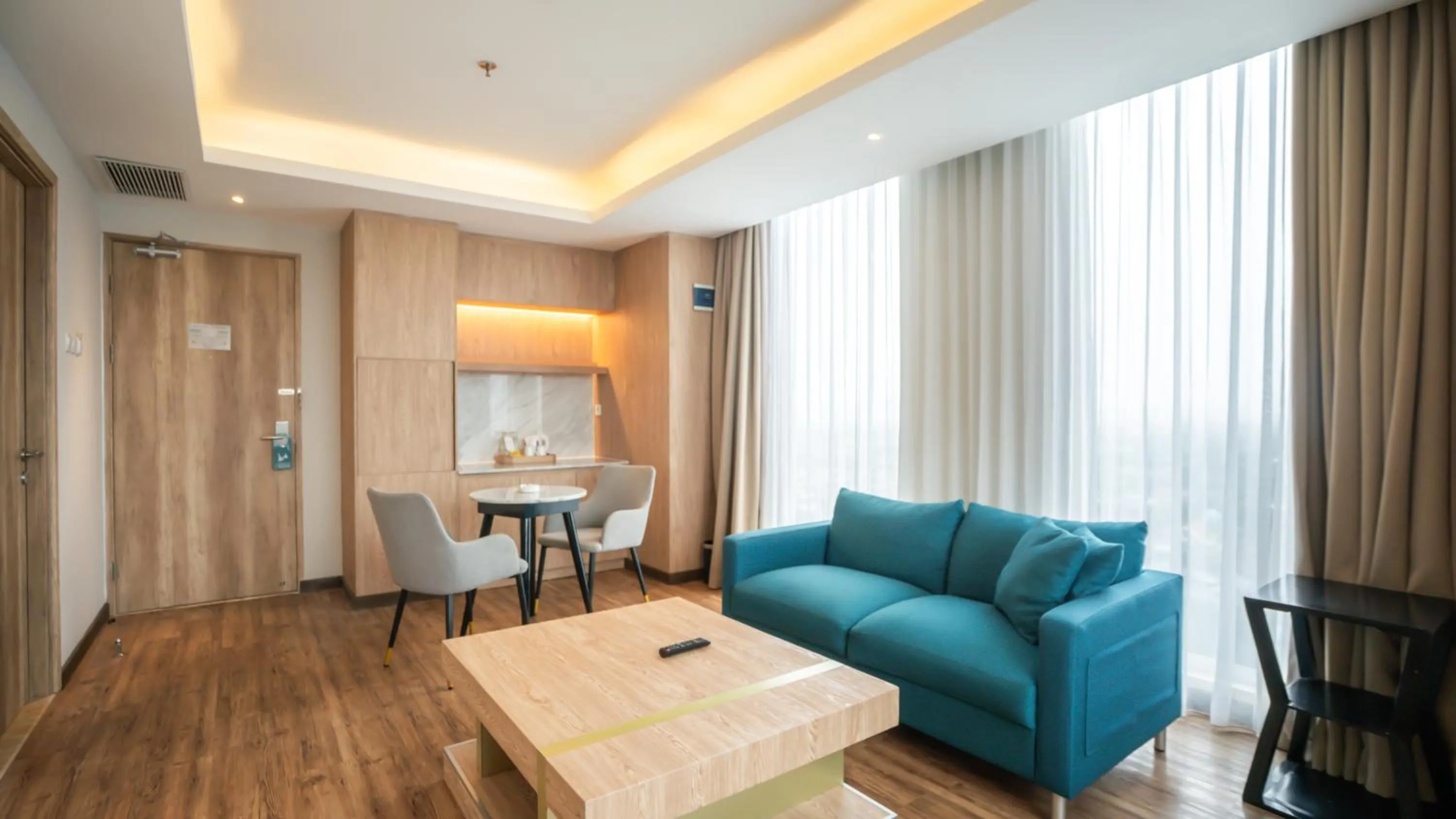 Living room in Bigland Bogor Hotel Powered by Archipelago