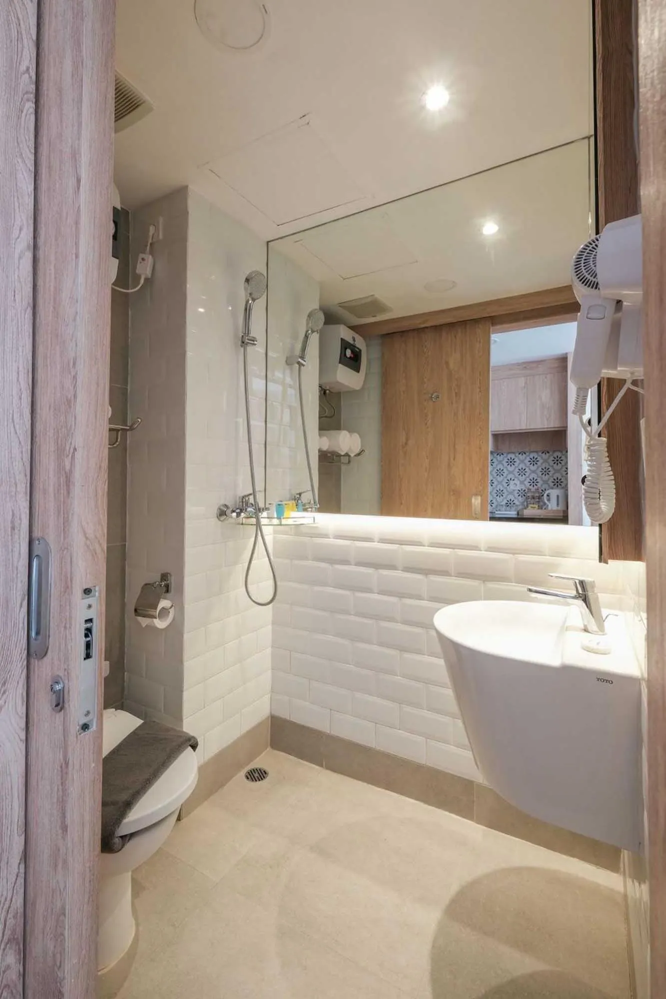 Toilet in Bigland Bogor Hotel Powered by Archipelago