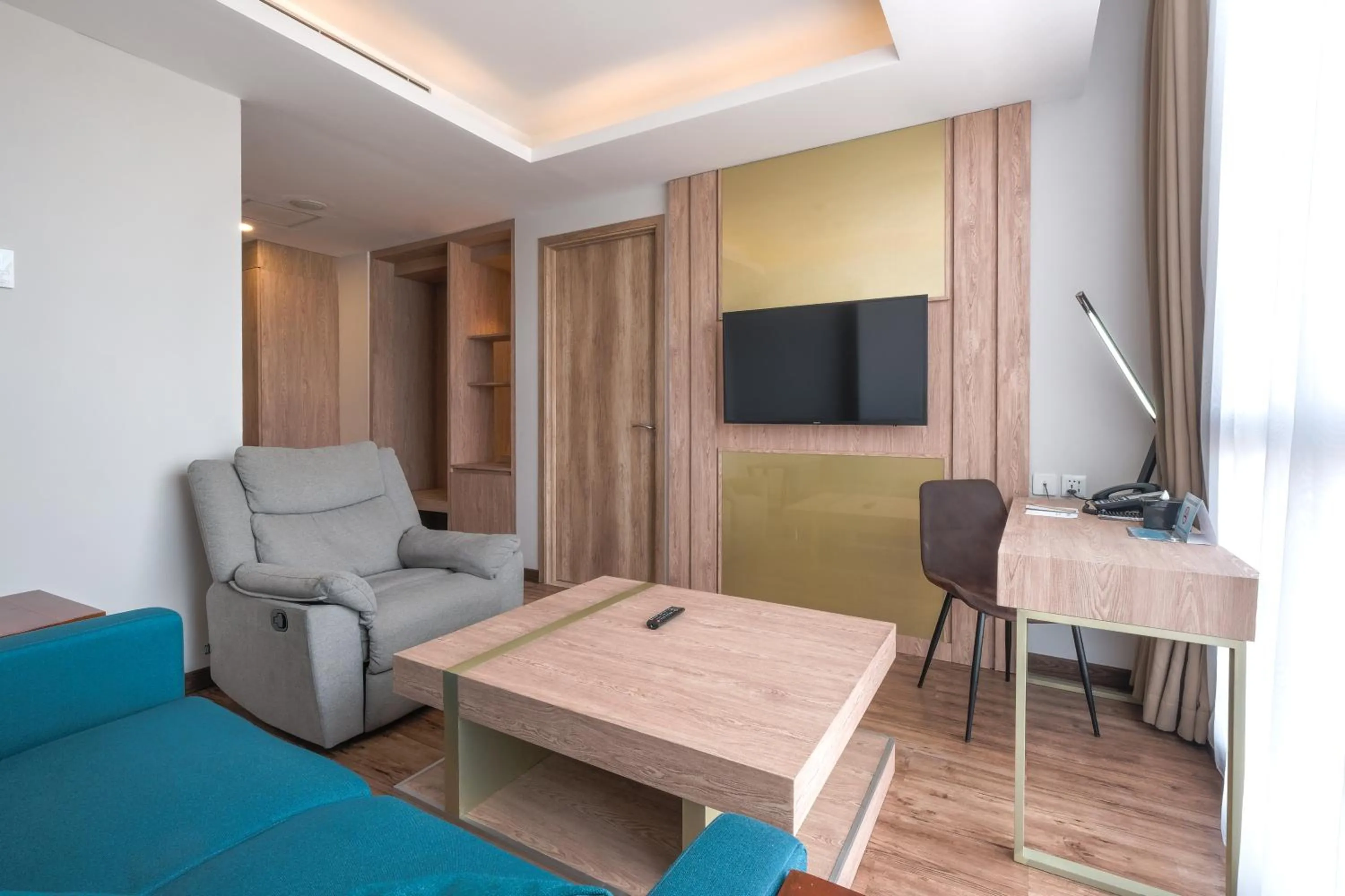 Living room in Bigland Bogor Hotel Powered by Archipelago