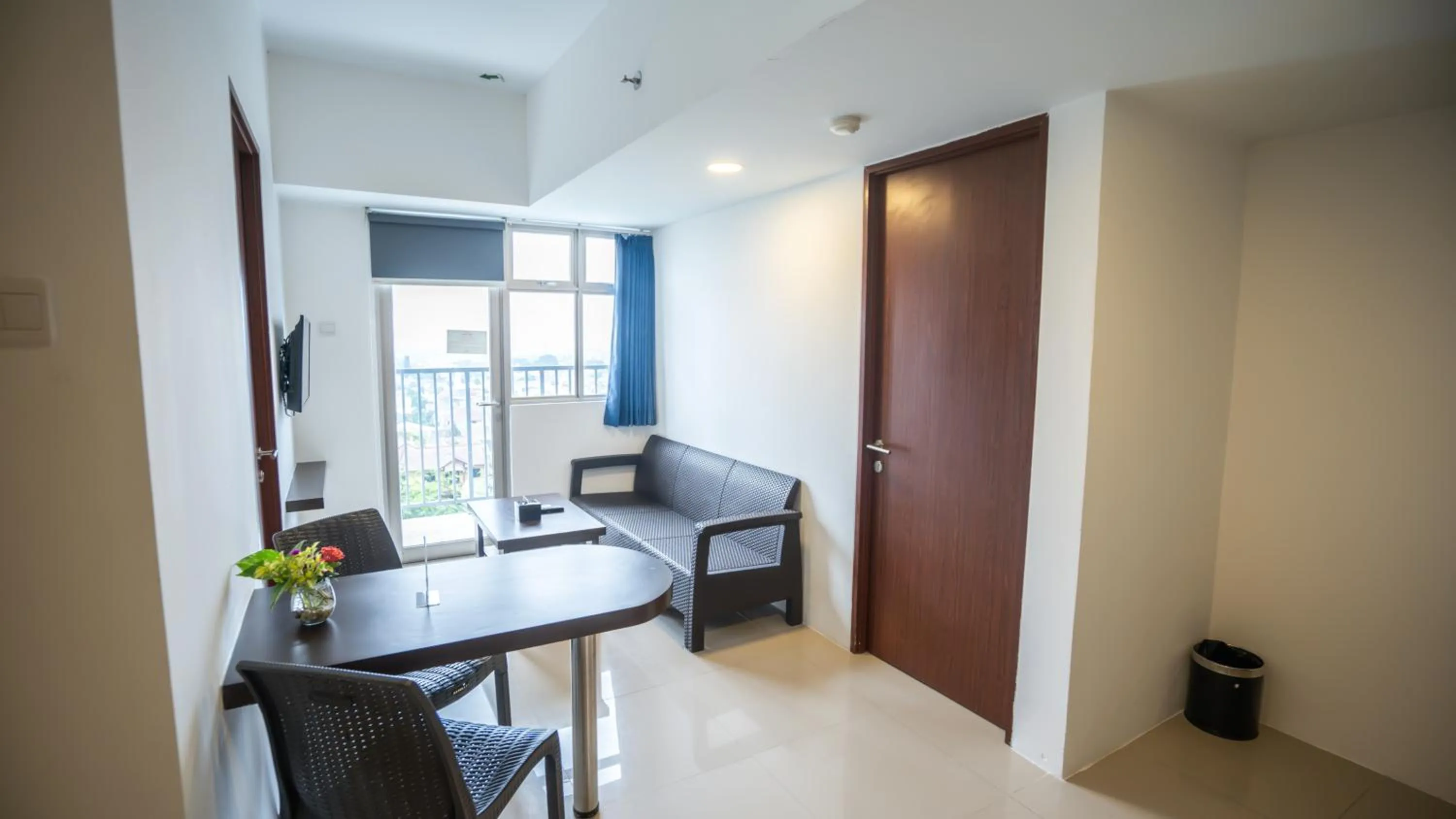 Living room in Bigland Bogor Hotel Powered by Archipelago