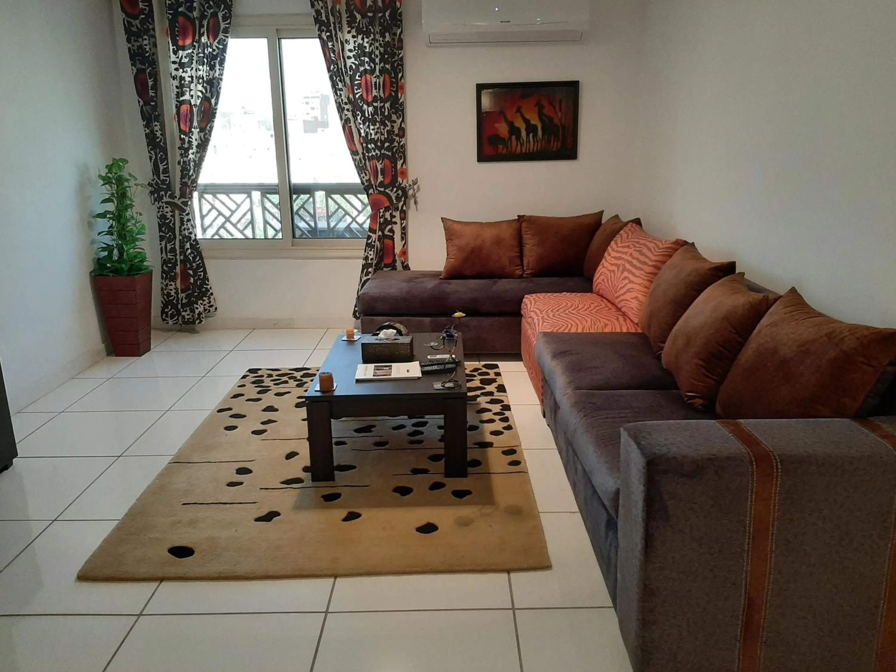 Living room in Pyramids Gem Plaza Powered By Look