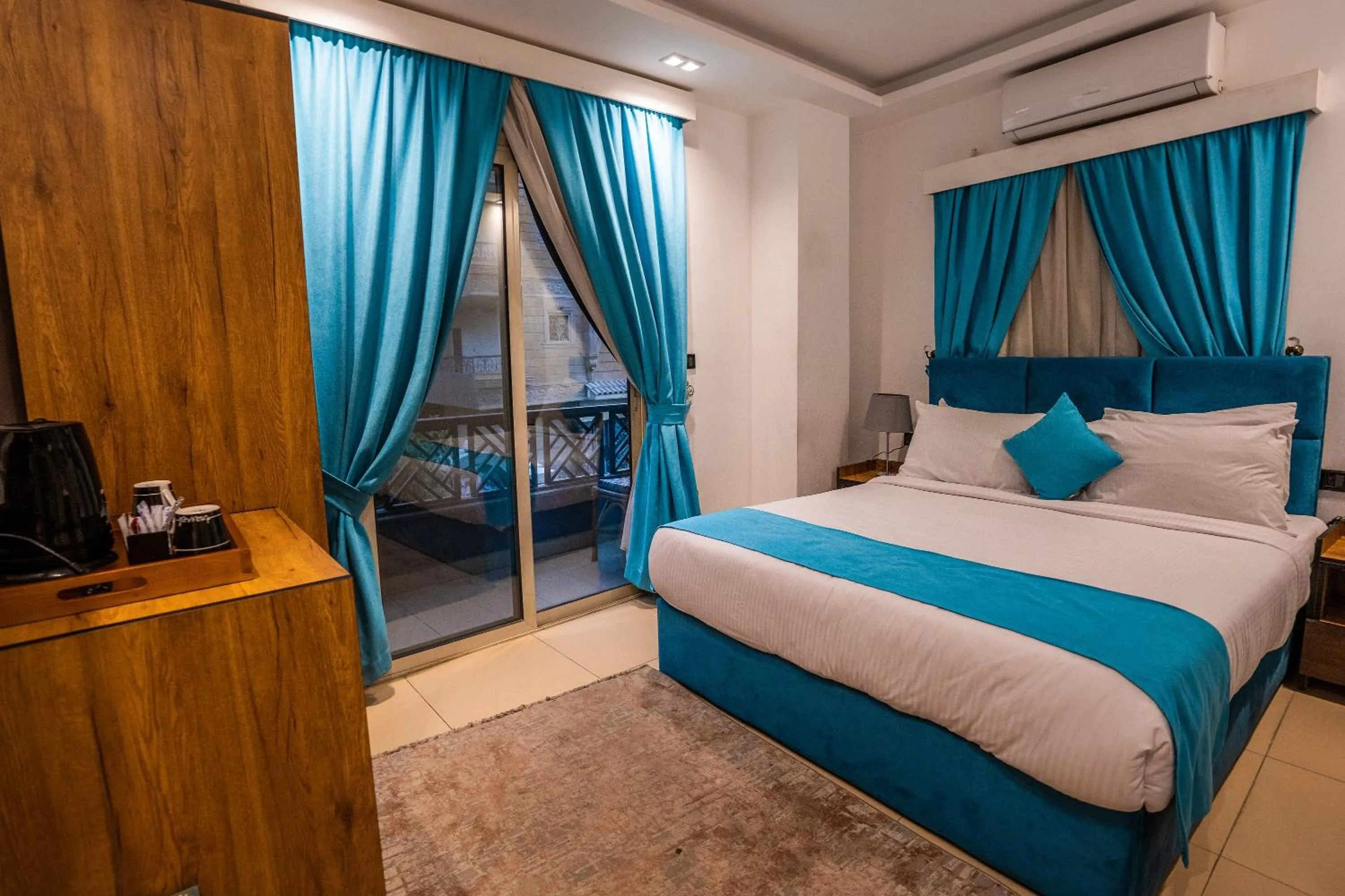 Photo of the whole room in Pyramids Gem Plaza Powered By Look