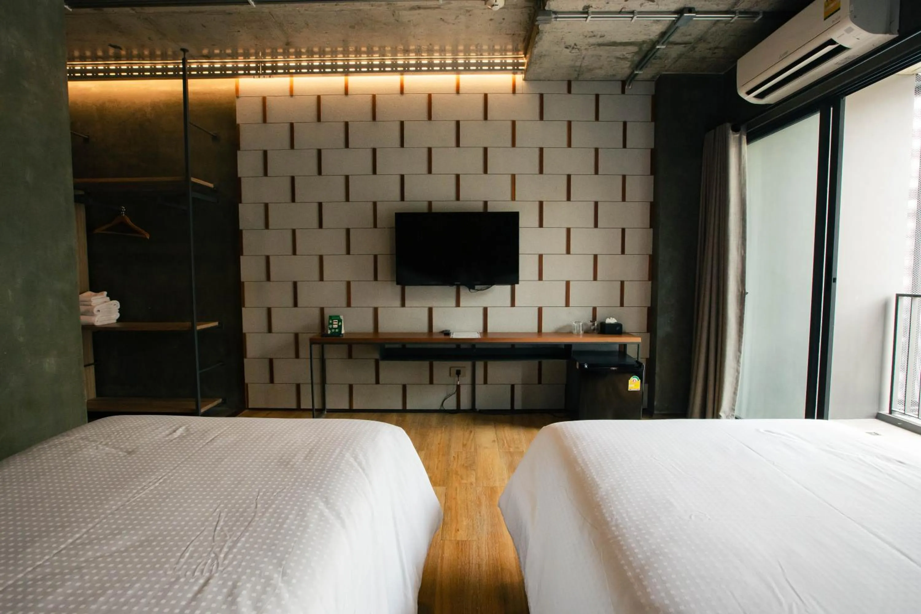 Bed in Navakitel Design Hotel