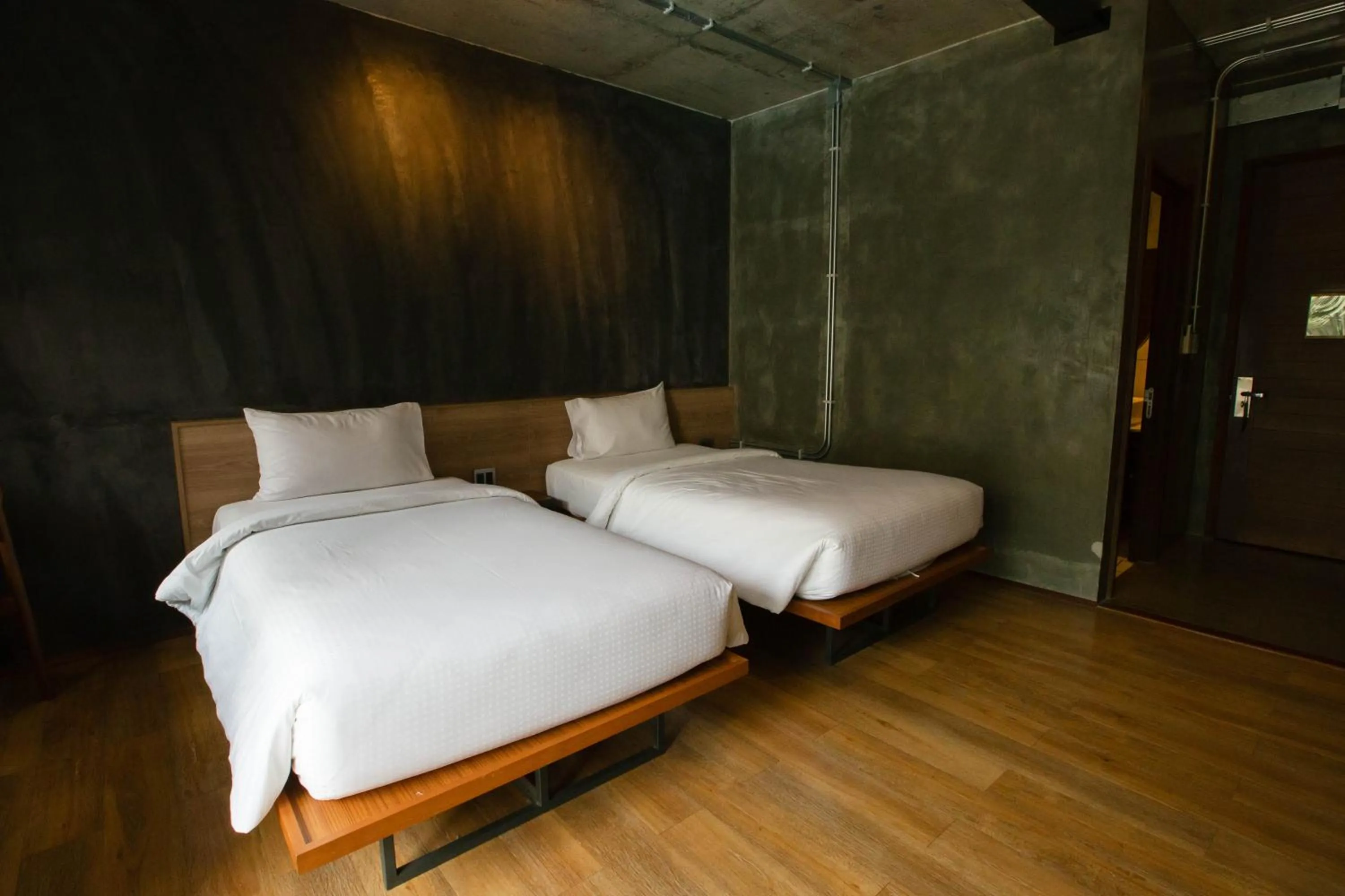 Bed in Navakitel Design Hotel
