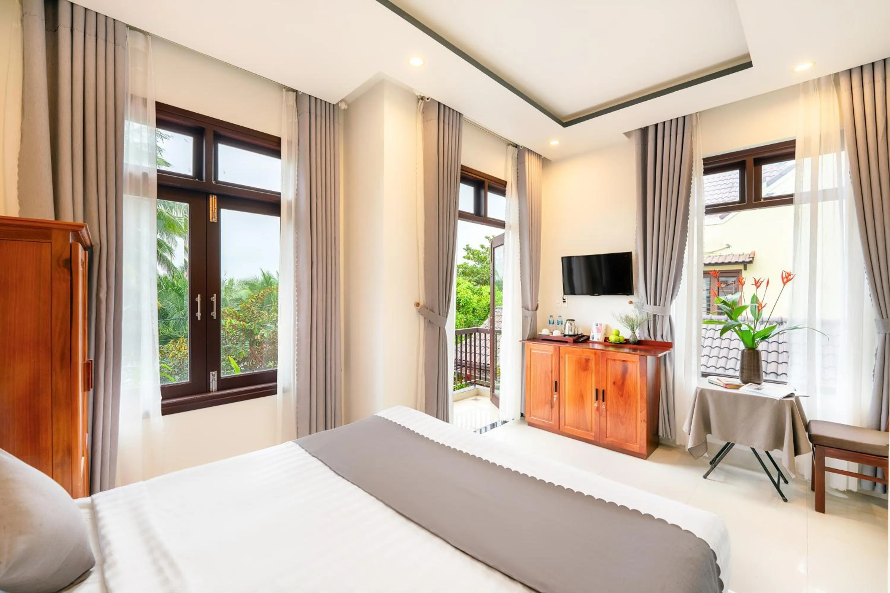 Bed in Sands River Hoi An Villa