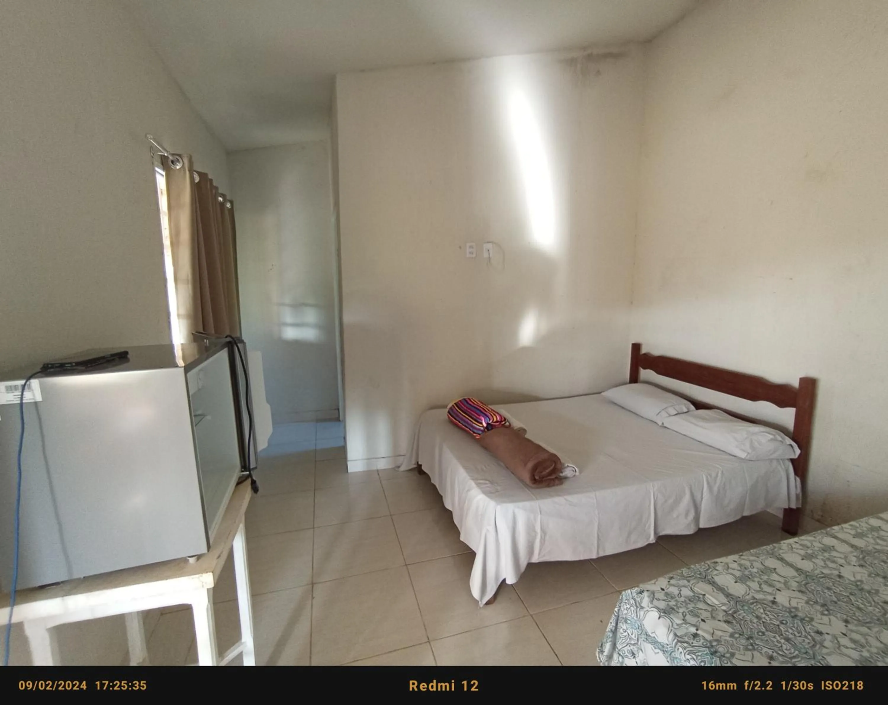 Bed in Pousada flores de ipê