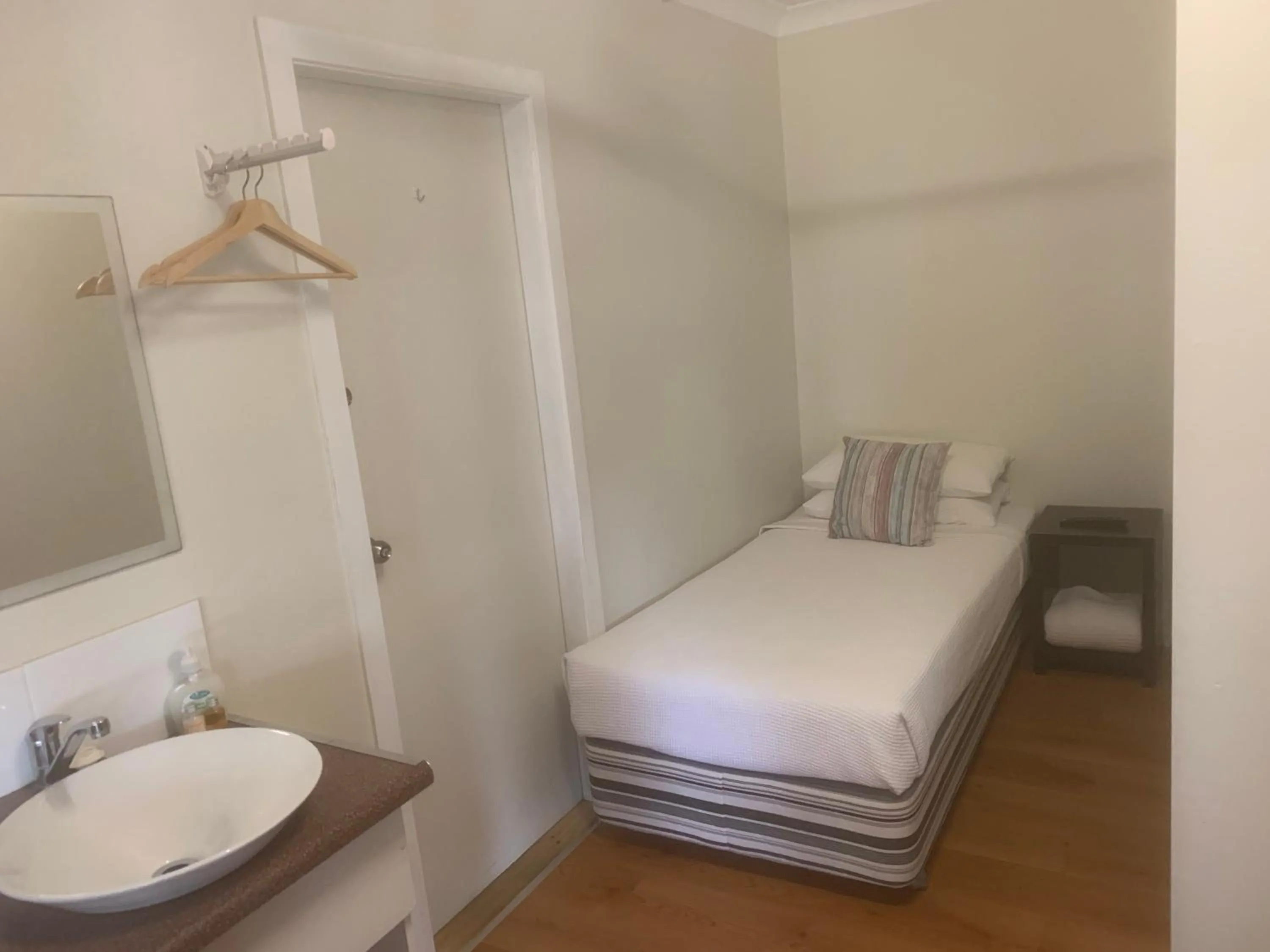 Bed in T's Resort & Motel