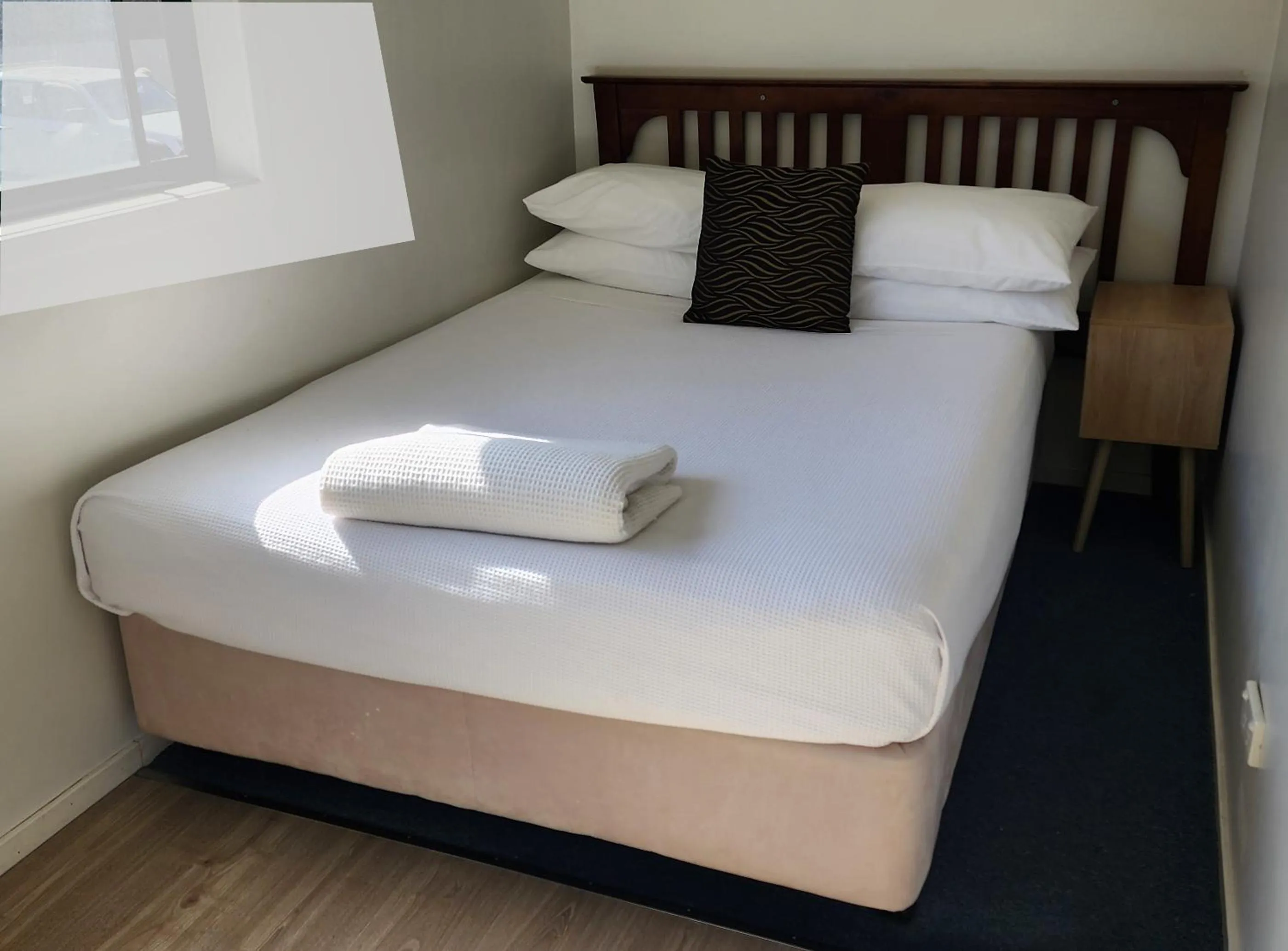 Bed in T's Resort & Motel