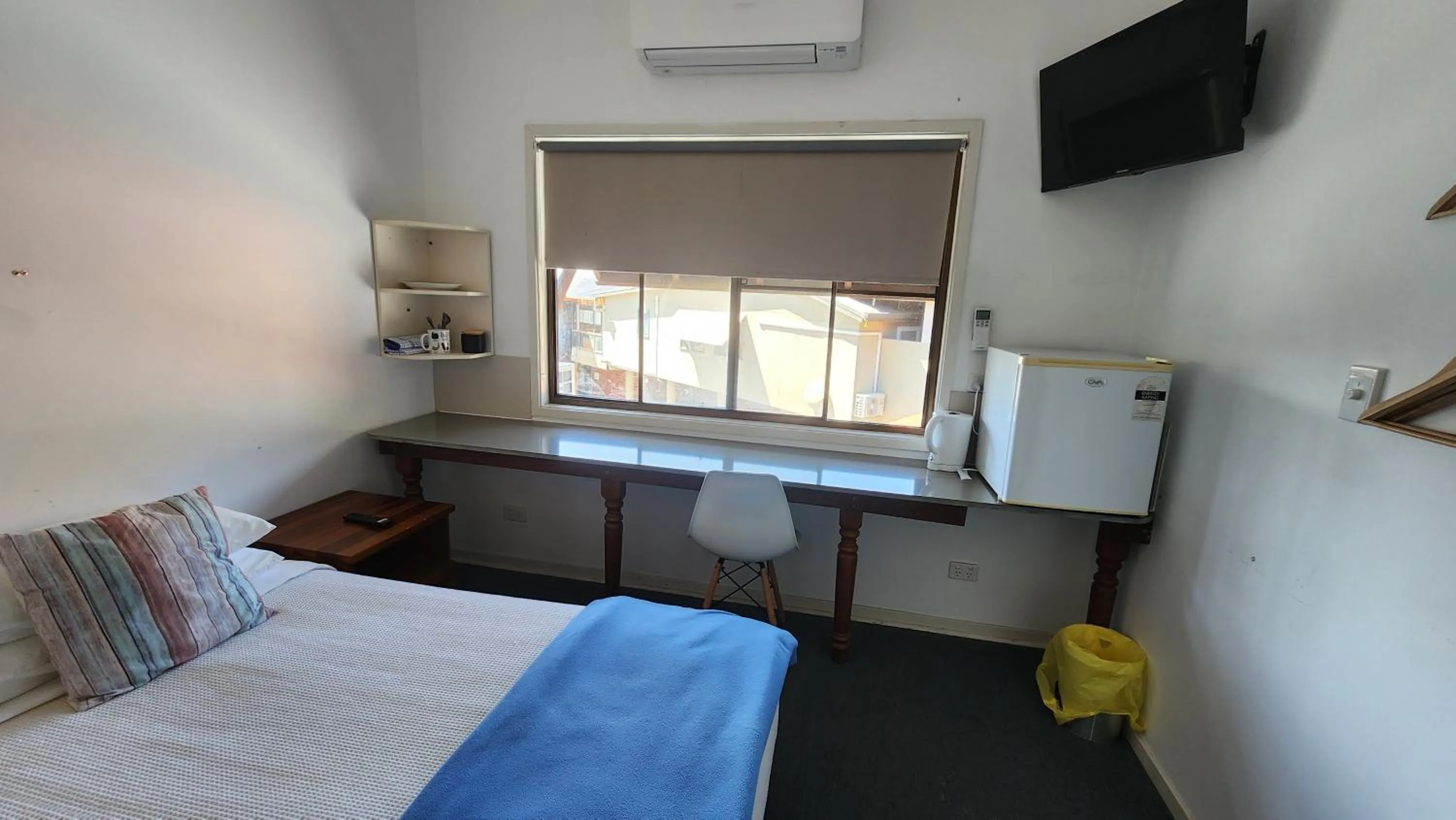 Bed in T's Resort & Motel