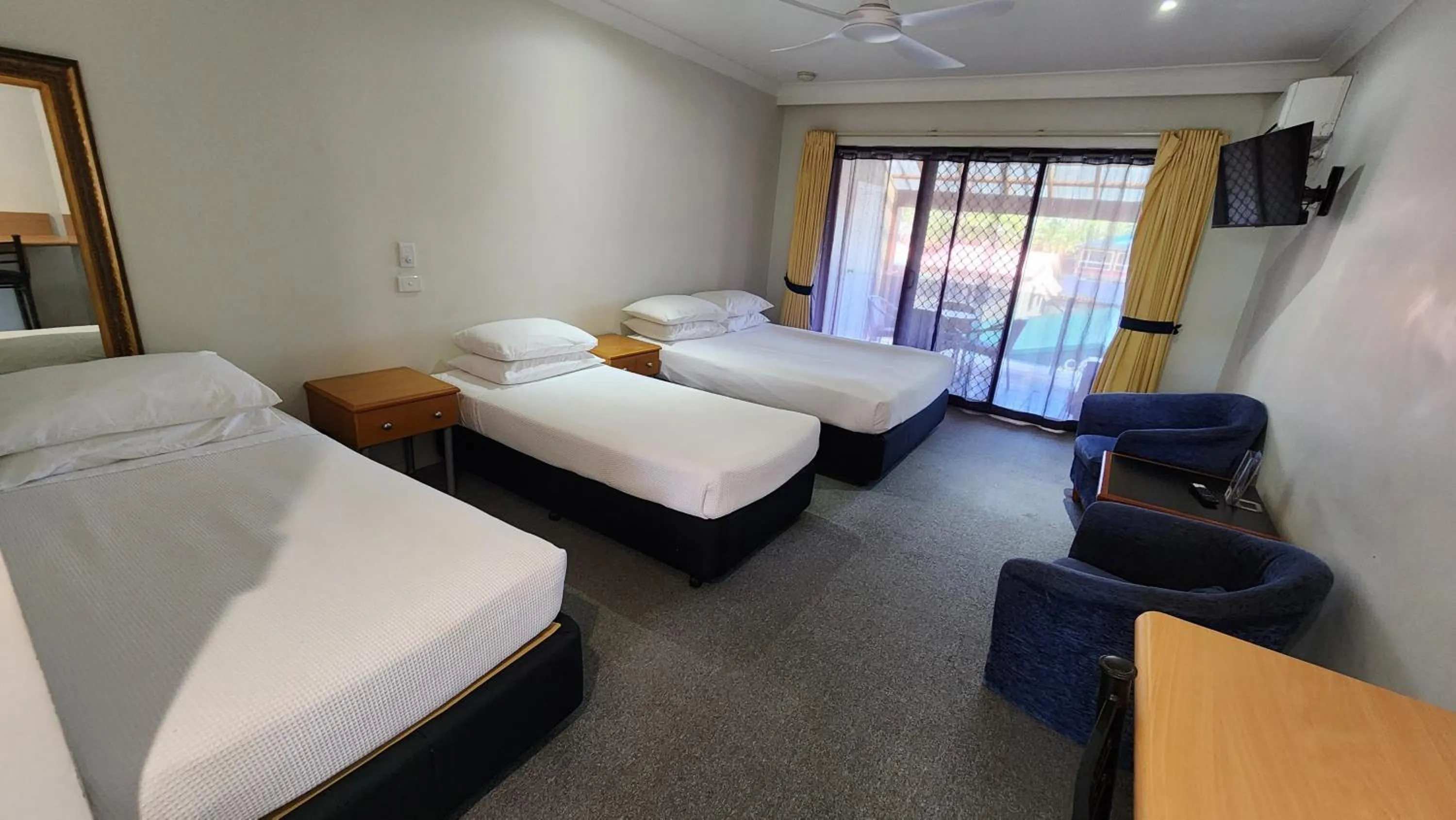 Bed in T's Resort & Motel