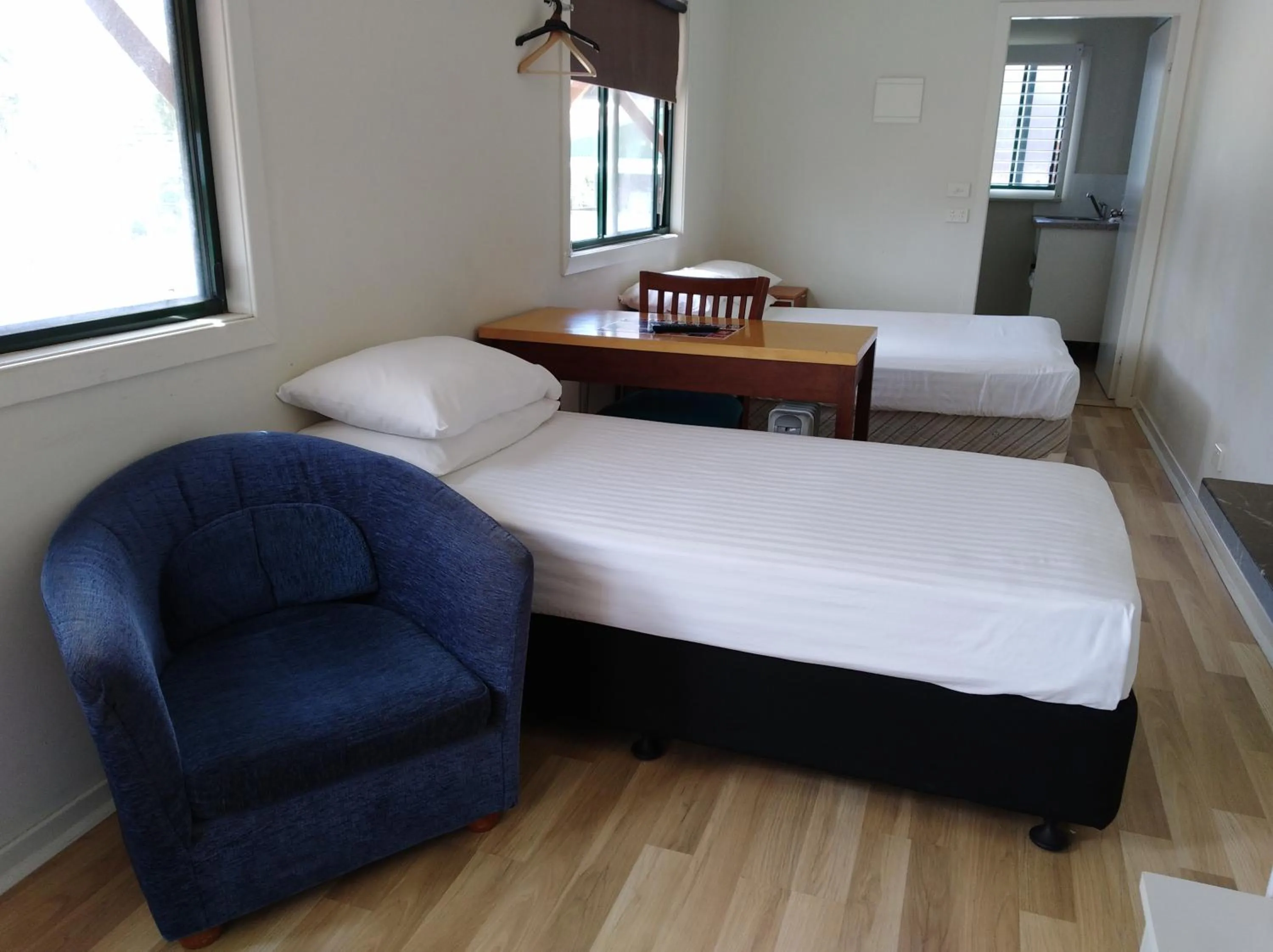 Bed in T's Resort & Motel