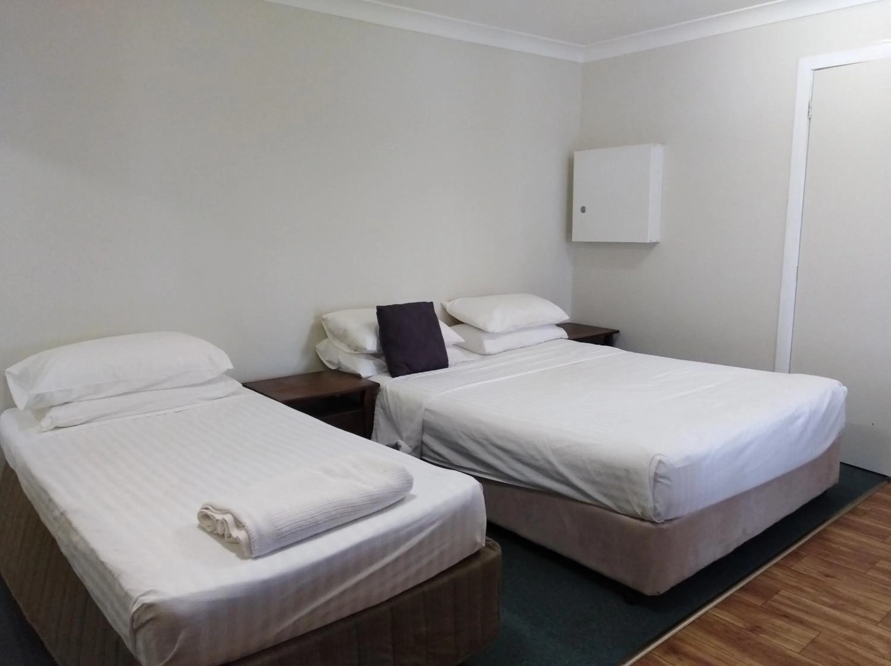 Bed in T's Resort & Motel