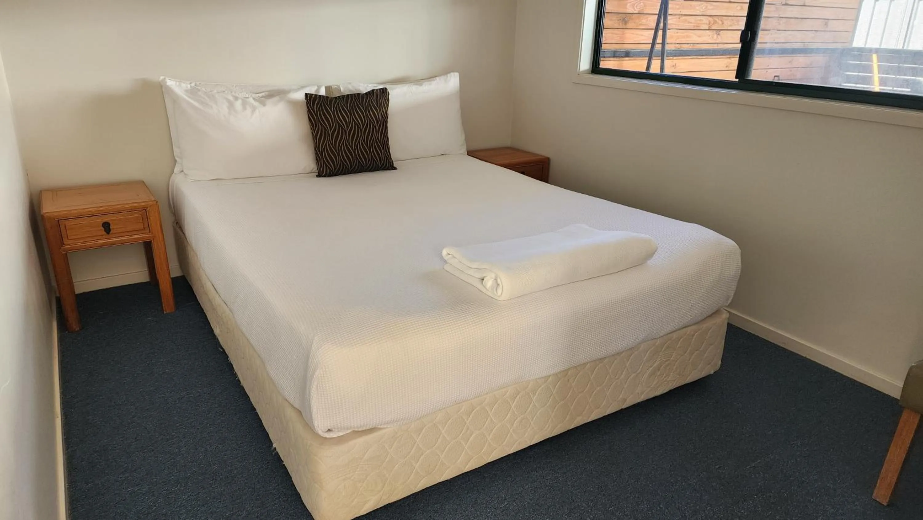 Bed in T's Resort & Motel