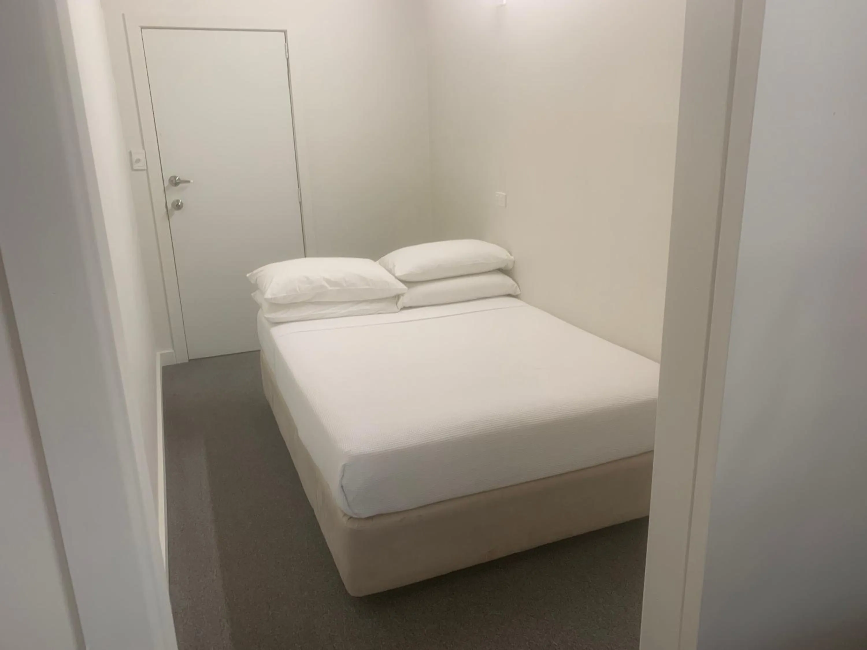 Bed in T's Resort & Motel